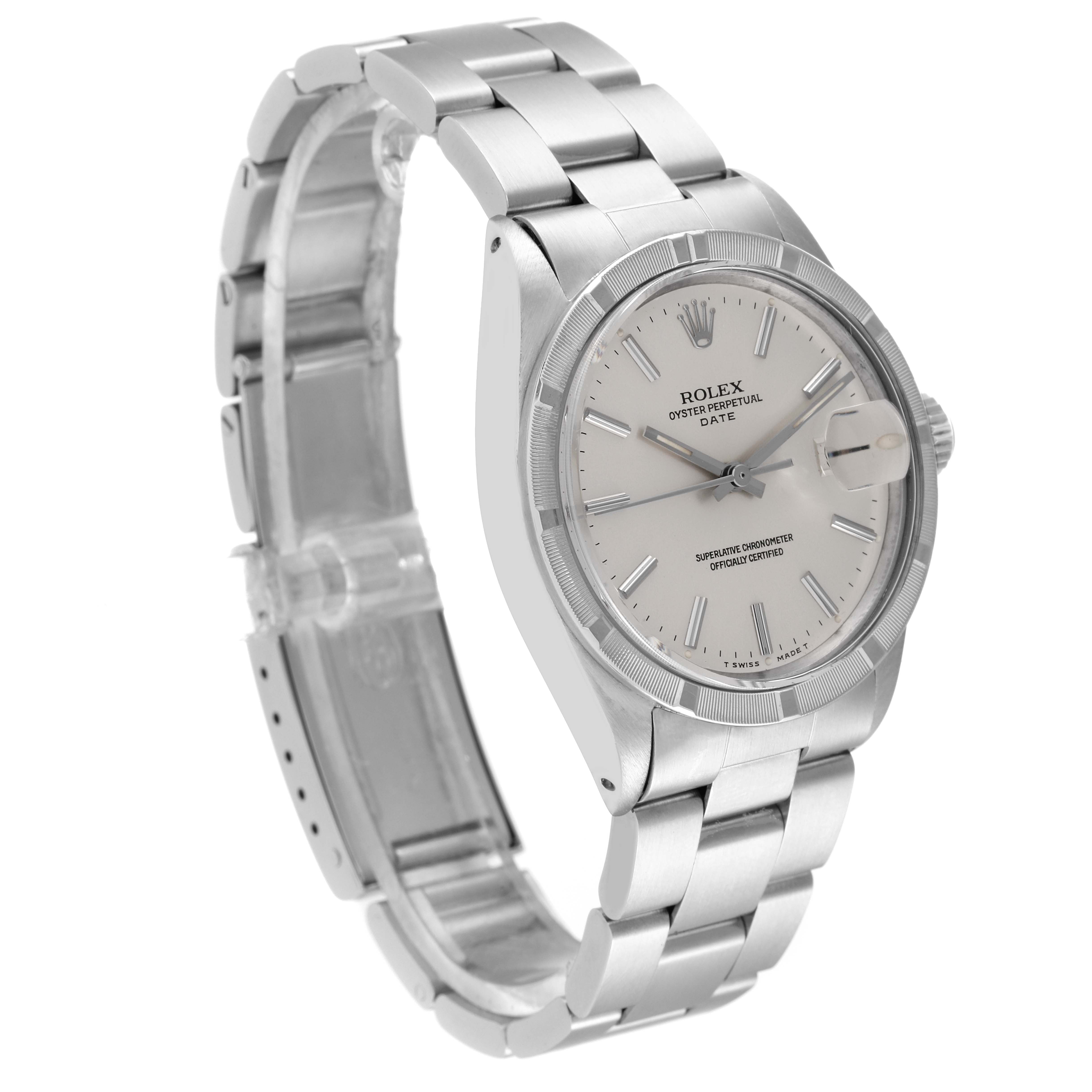 The image shows a side angle view of the Rolex Vintage Collection 1501 Men
s Stainless Steel Silver Dial 1501 Men
s Stainless Steel Silver Dial watch, highlighting its face, bezel, and bracelet.