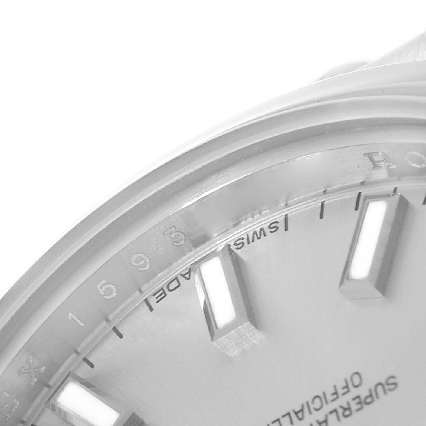 The image shows a close-up of the dial and bezel edge of a Rolex Datejust 179160 Women's Stainless Steel Silver Dial 179160 Women's Stainless Steel Silver Dial watch, highlighting the minute markers and parts of the inscriptions.