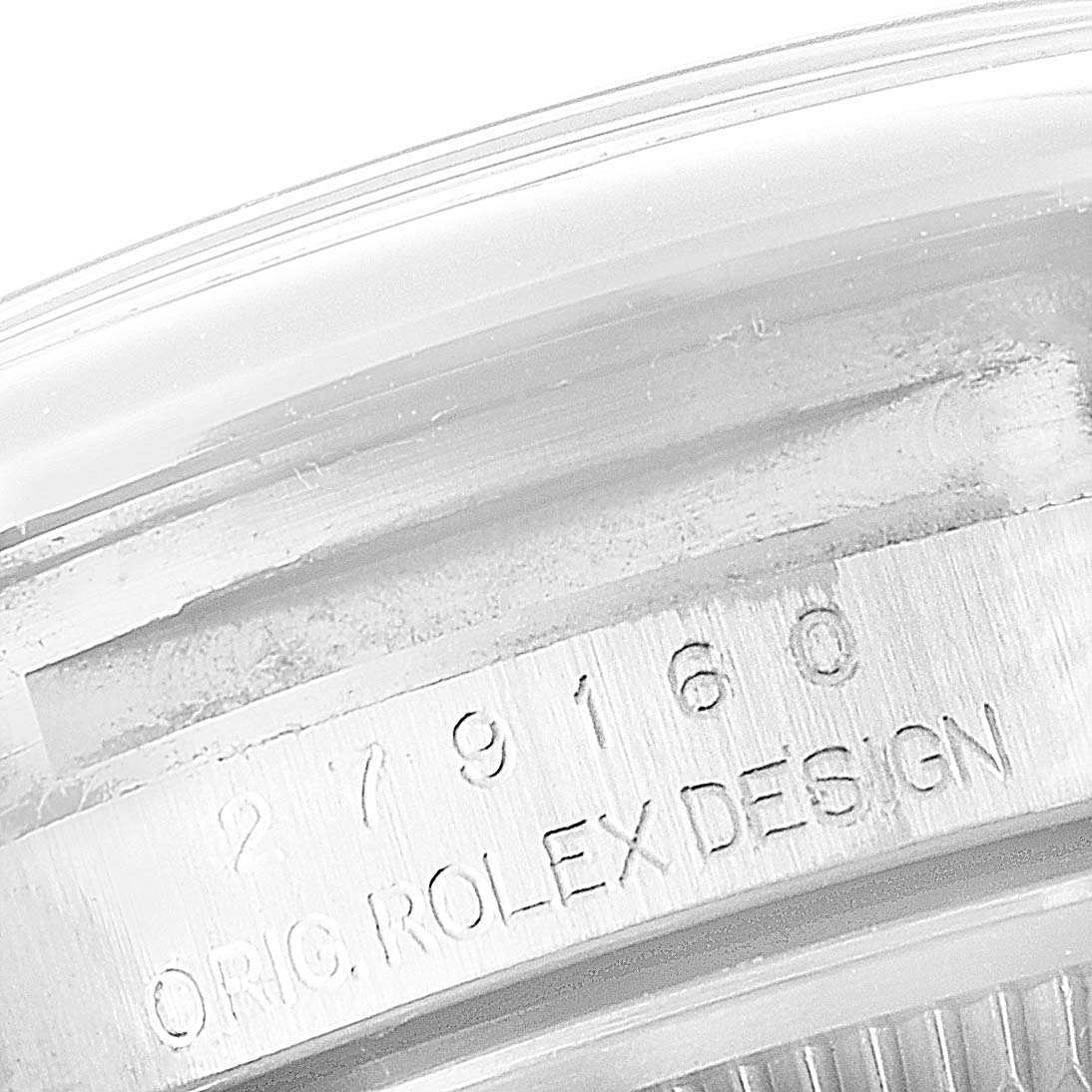 The image shows a close-up of the engraved serial number and design details on the side of the Rolex Datejust 279160 Women's Stainless Steel Pink Dial 279160 Women's Stainless Steel Pink Dial model.