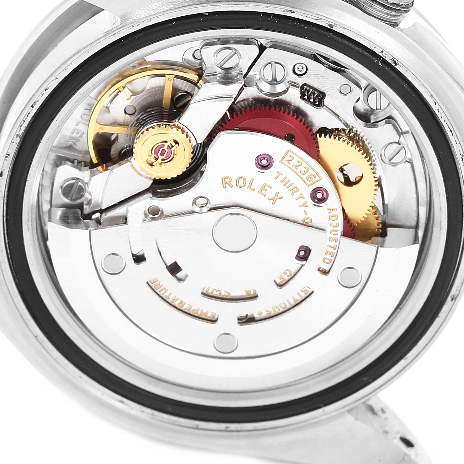 The image shows the back view of a Rolex Datejust 279160 Women's Stainless Steel Pink Dial 279160 Women's Stainless Steel Pink Dial watch, displaying its intricate mechanical movement and components.