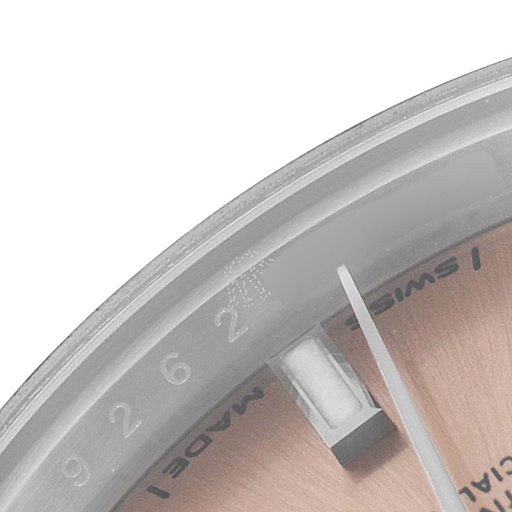 This close-up image shows the dial and chapter ring near 11 o'clock on a Rolex Datejust 279160 Women's Stainless Steel Pink Dial 279160 Women's Stainless Steel Pink Dial watch.
