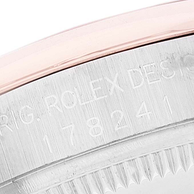 The image shows a close-up of the side of the bezel and engraved markings on the case of the Rolex Datejust 178241 Women's Steel and Gold (two tone) Black Dial 178241 Women's Steel and Gold (two tone) Black Dial watch.