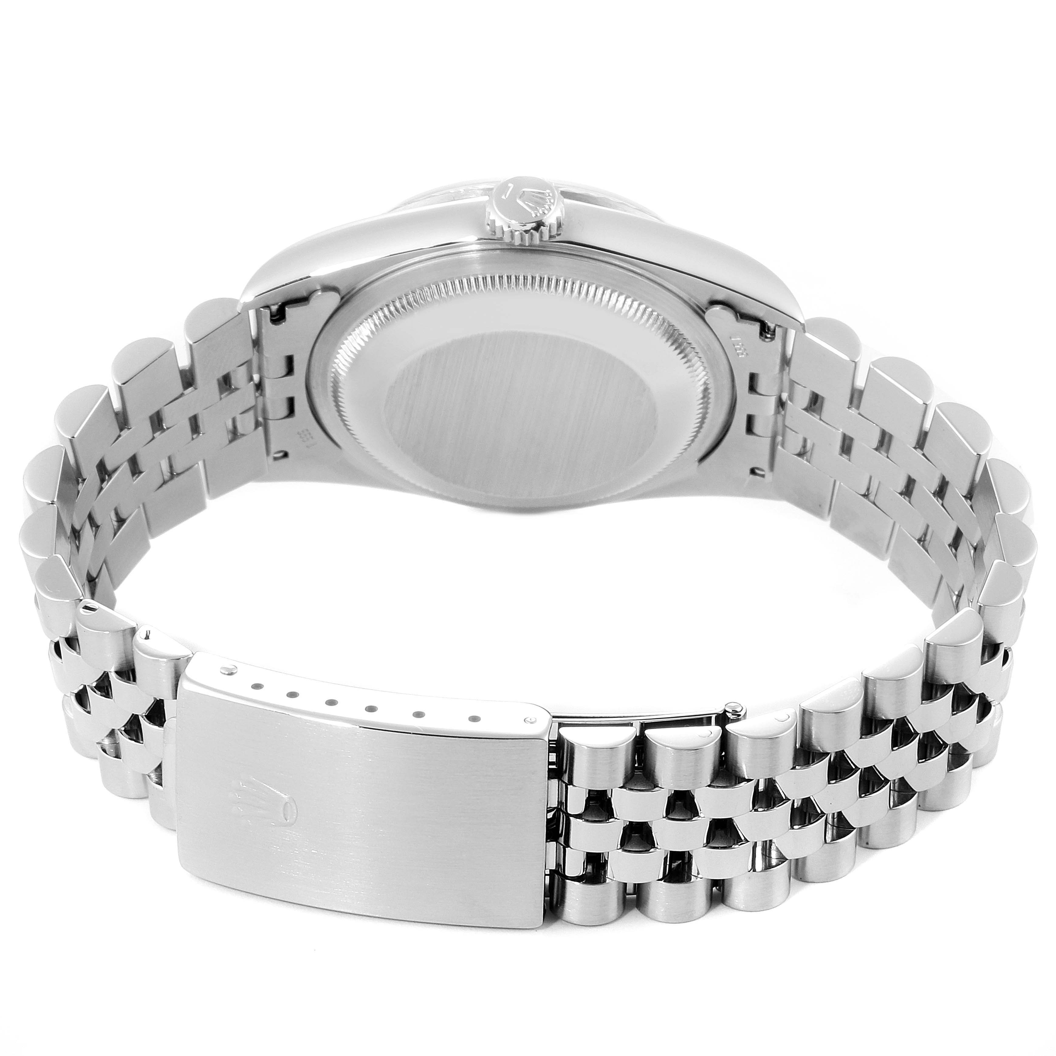 The image shows the back view of a Rolex Datejust 16234 Men's Stainless Steel Blue Dial 16234 Men's Stainless Steel Blue Dial watch, highlighting the case back, crown, and bracelet.