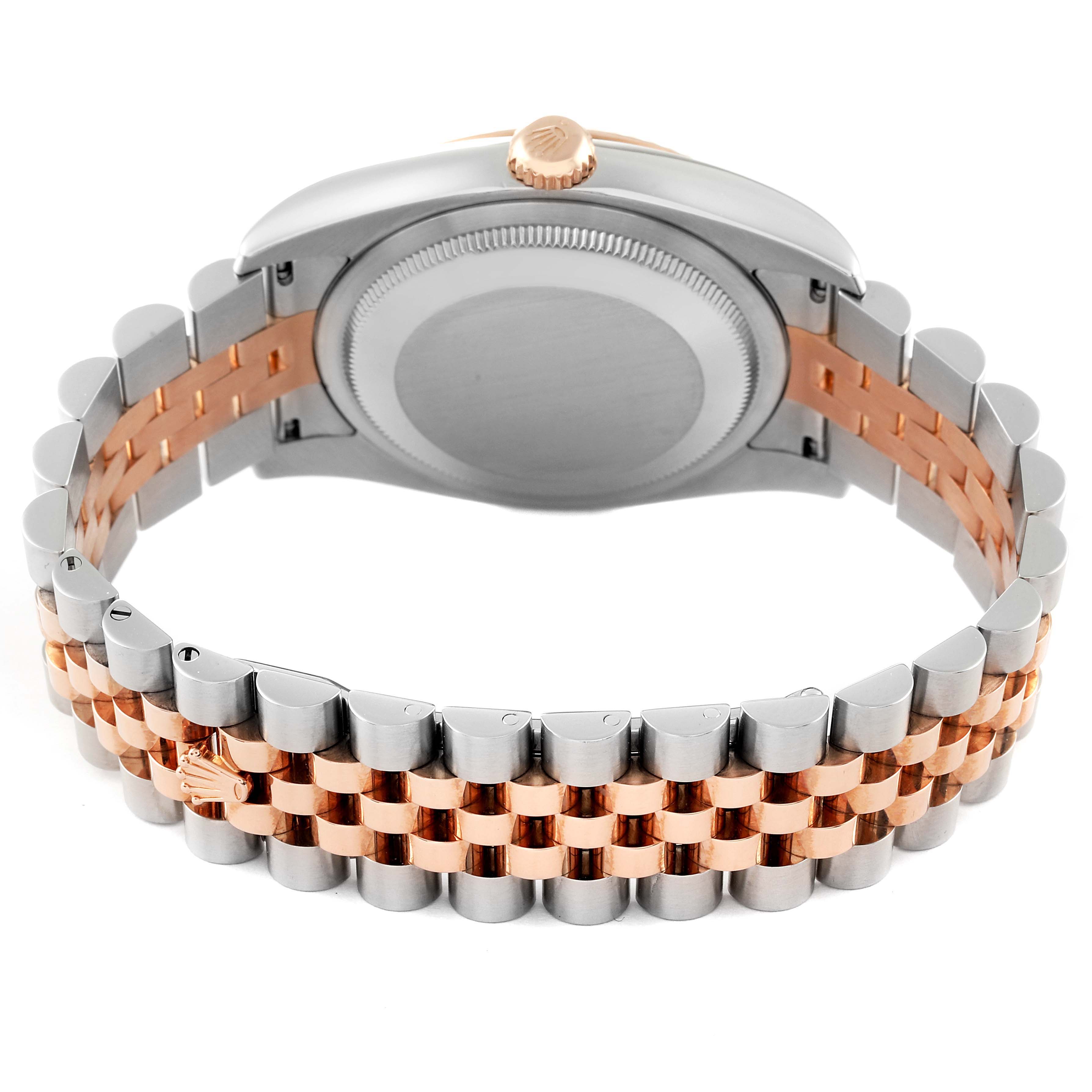 The image shows the back view of a Rolex Datejust 116231 Men's Steel and Gold (two tone) Pink Dial 116231 Men's Steel and Gold (two tone) Pink Dial watch, highlighting its two-tone bracelet and case back.