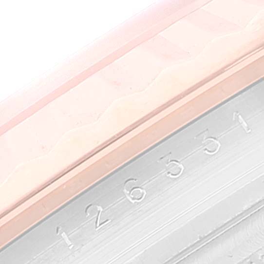 This is a close-up of the Datejust 41 model by Rolex, focusing on the partially visible fluted bezel and date window.