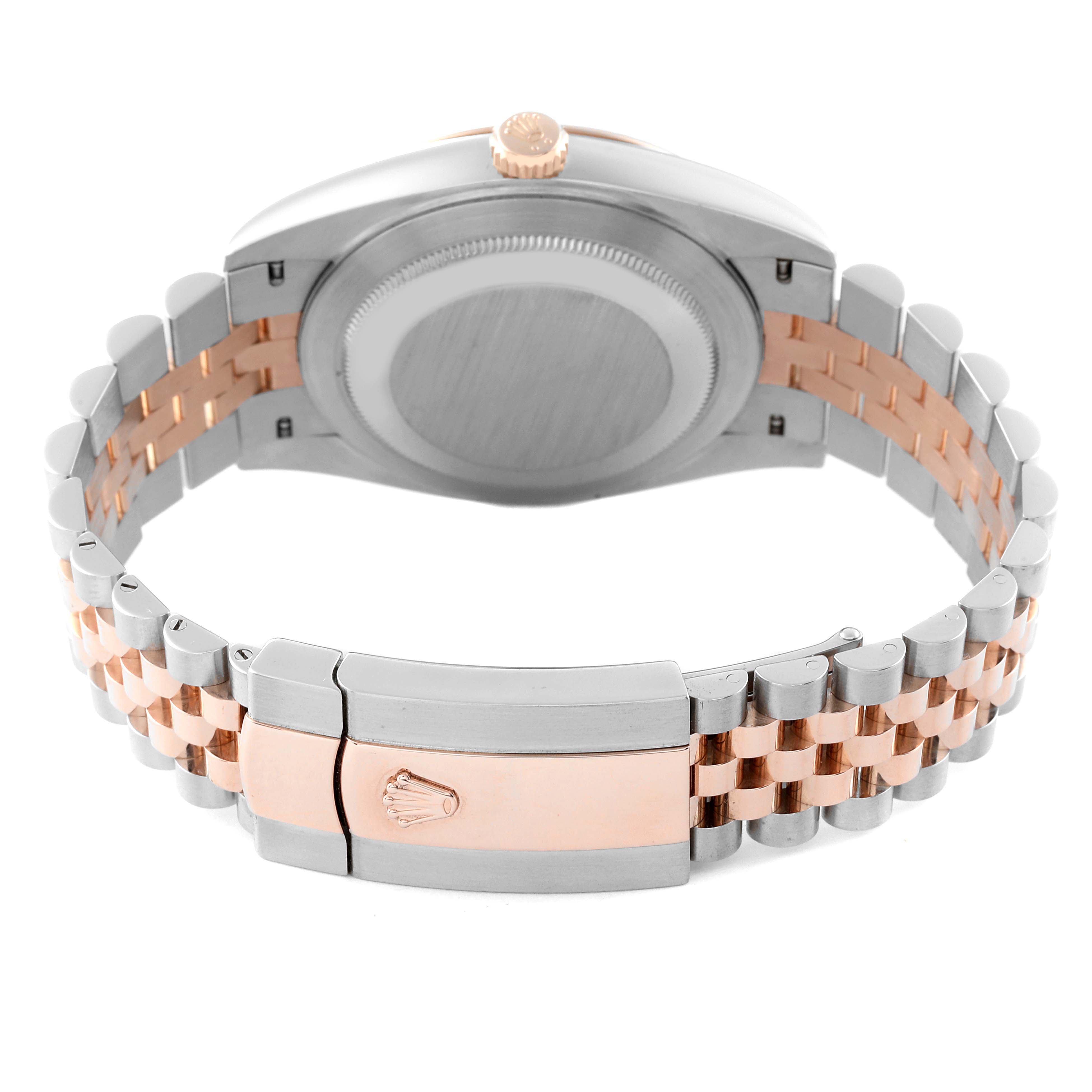 The Rolex Datejust 41 126331 Men's Steel and Gold (two tone) Brown Dial 126331 Men's Steel and Gold (two tone) Brown Dial watch is shown from the rear, highlighting its back cover, crown, and two-tone bracelet with a clasp.