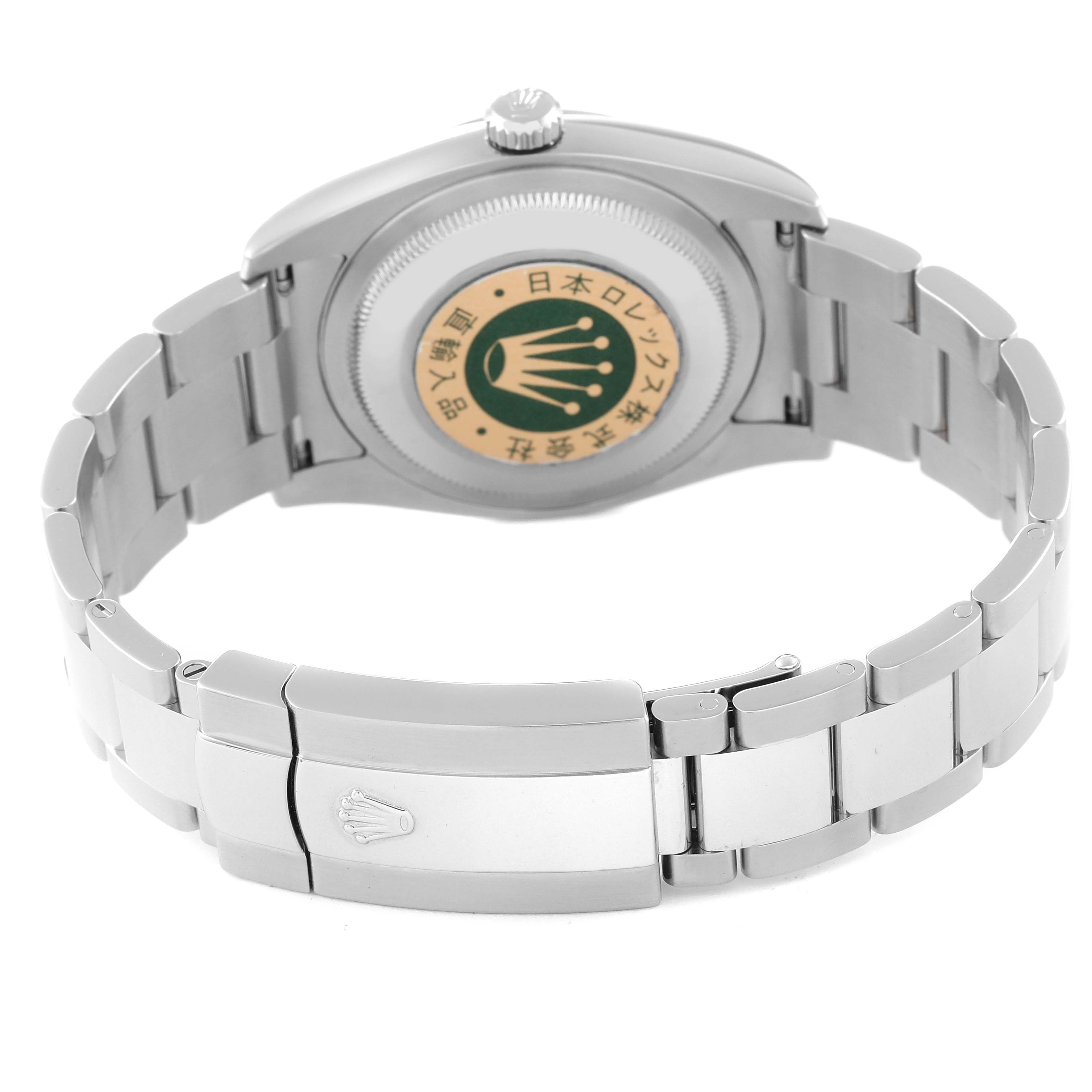 The image shows the back side of a Rolex Datejust 116200 Men's Stainless Steel Blue Dial 116200 Men's Stainless Steel Blue Dial watch, highlighting the case back and stainless steel bracelet clasp.