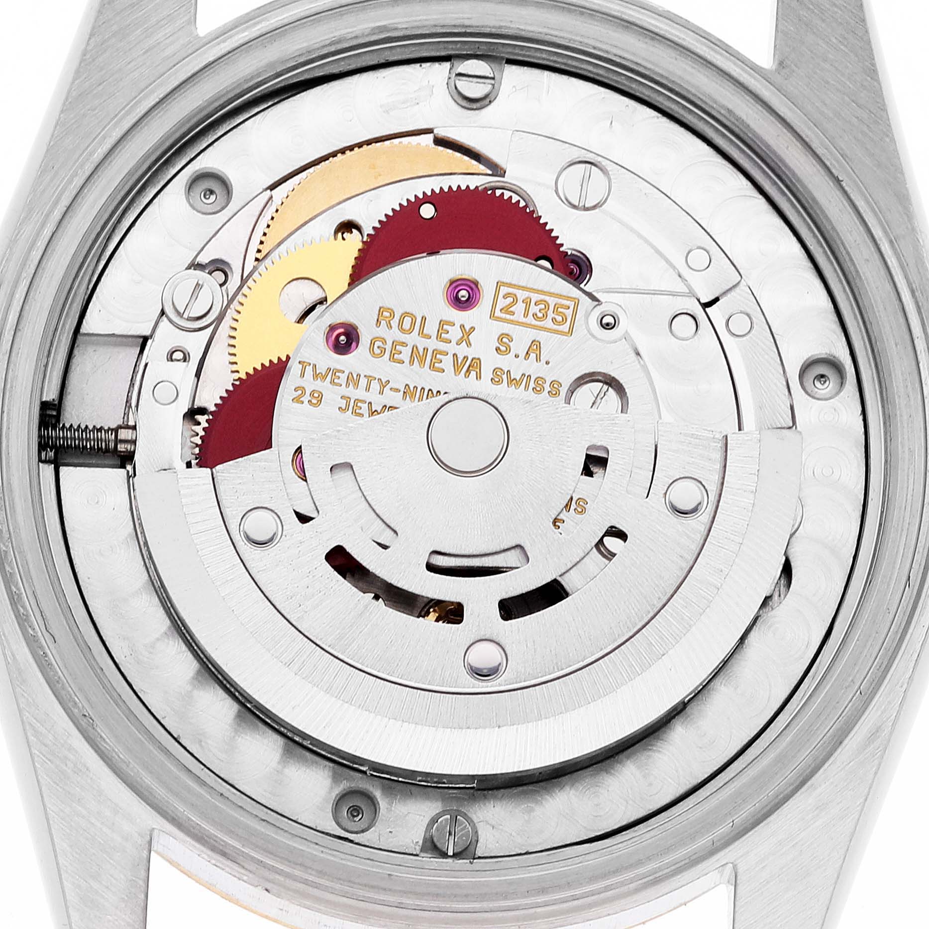 This is a close-up view of the mechanical movement inside a Rolex Mid-Size 68273 Women's Steel and Gold (two tone) Mother of Pearl Dial 68273 Women's Steel and Gold (two tone) Mother of Pearl Dial watch, displaying the intricate inner components.