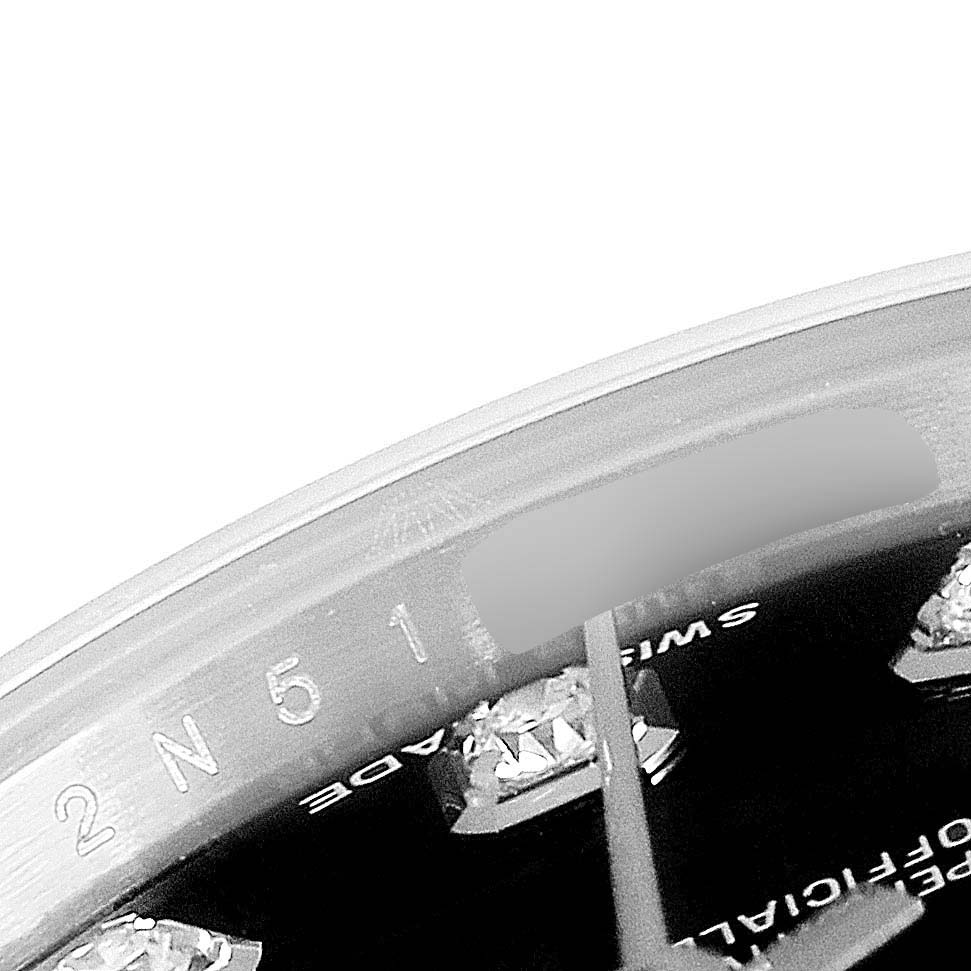 The image shows a close-up of the dial edge, diamond markers, and bezel of the Rolex Datejust 179174 Women's Stainless Steel Black Dial 179174 Women's Stainless Steel Black Dial.