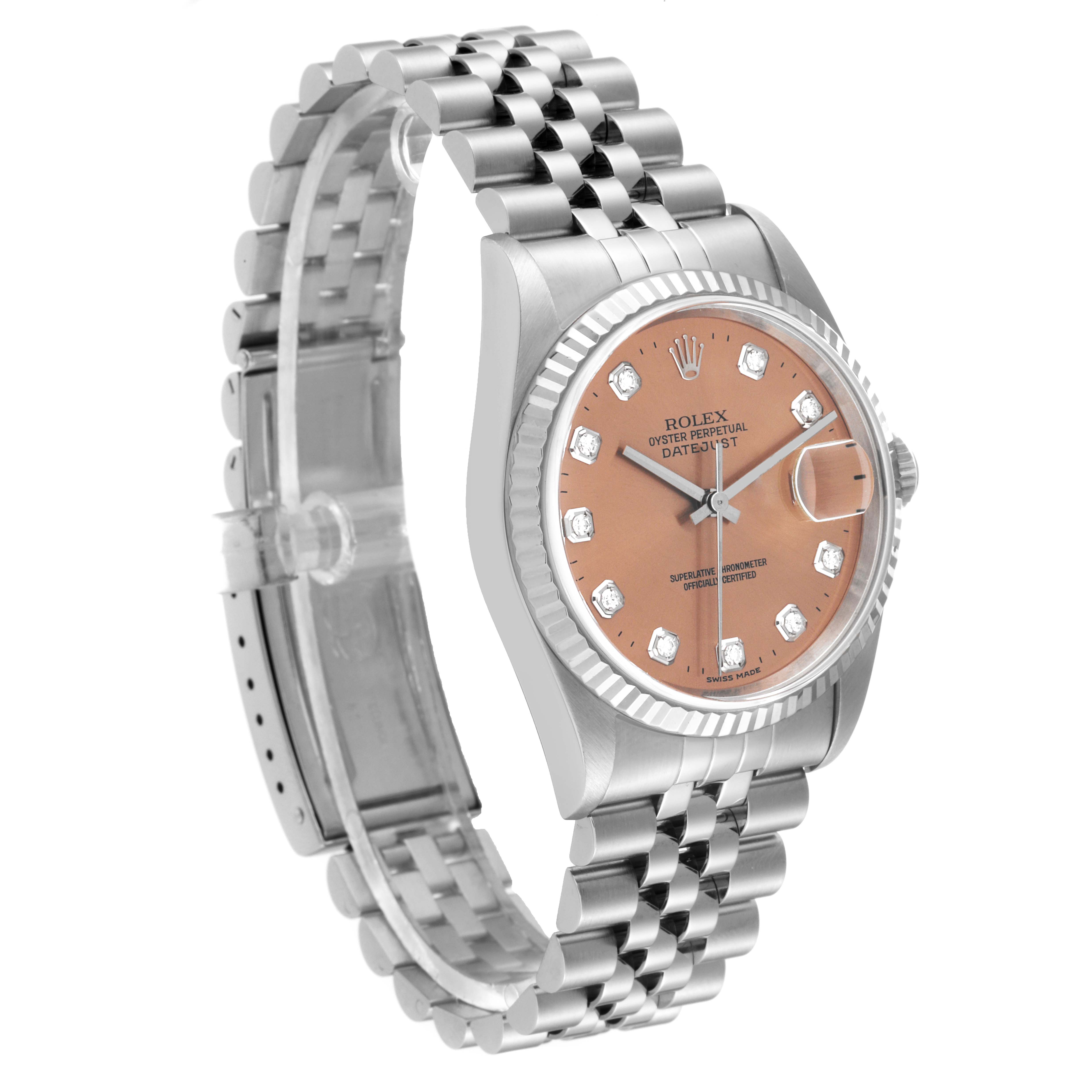 The image shows a Rolex Datejust 16234 Men's Stainless Steel Pink Dial 16234 Men's Stainless Steel Pink Dial watch from a left-angled front view, highlighting its fluted bezel, dial, and Jubilee bracelet.