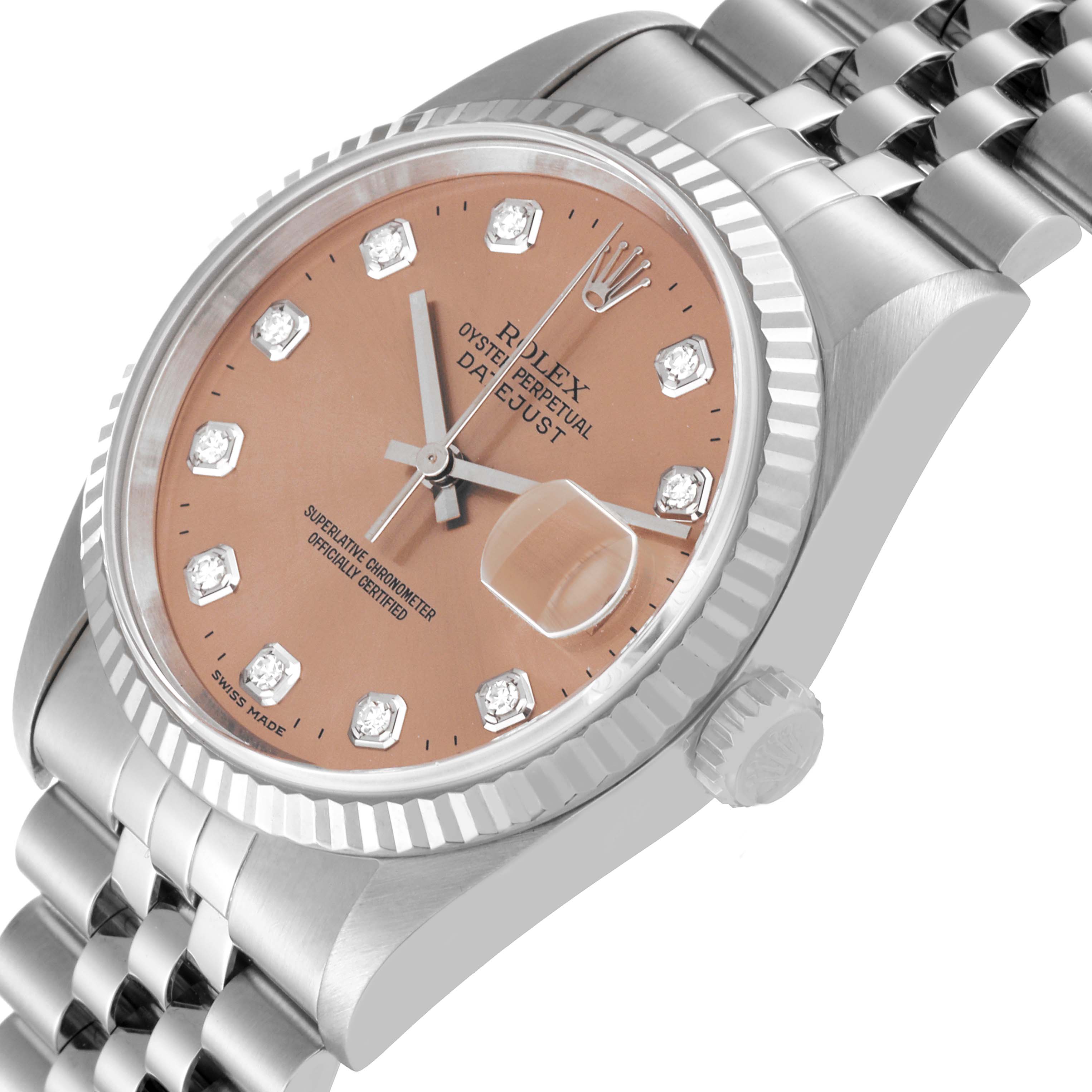 This is a close-up angled view of the Rolex Datejust 16234 Men's Stainless Steel Pink Dial 16234 Men's Stainless Steel Pink Dial watch, showing the dial, bezel, crown, and bracelet.
