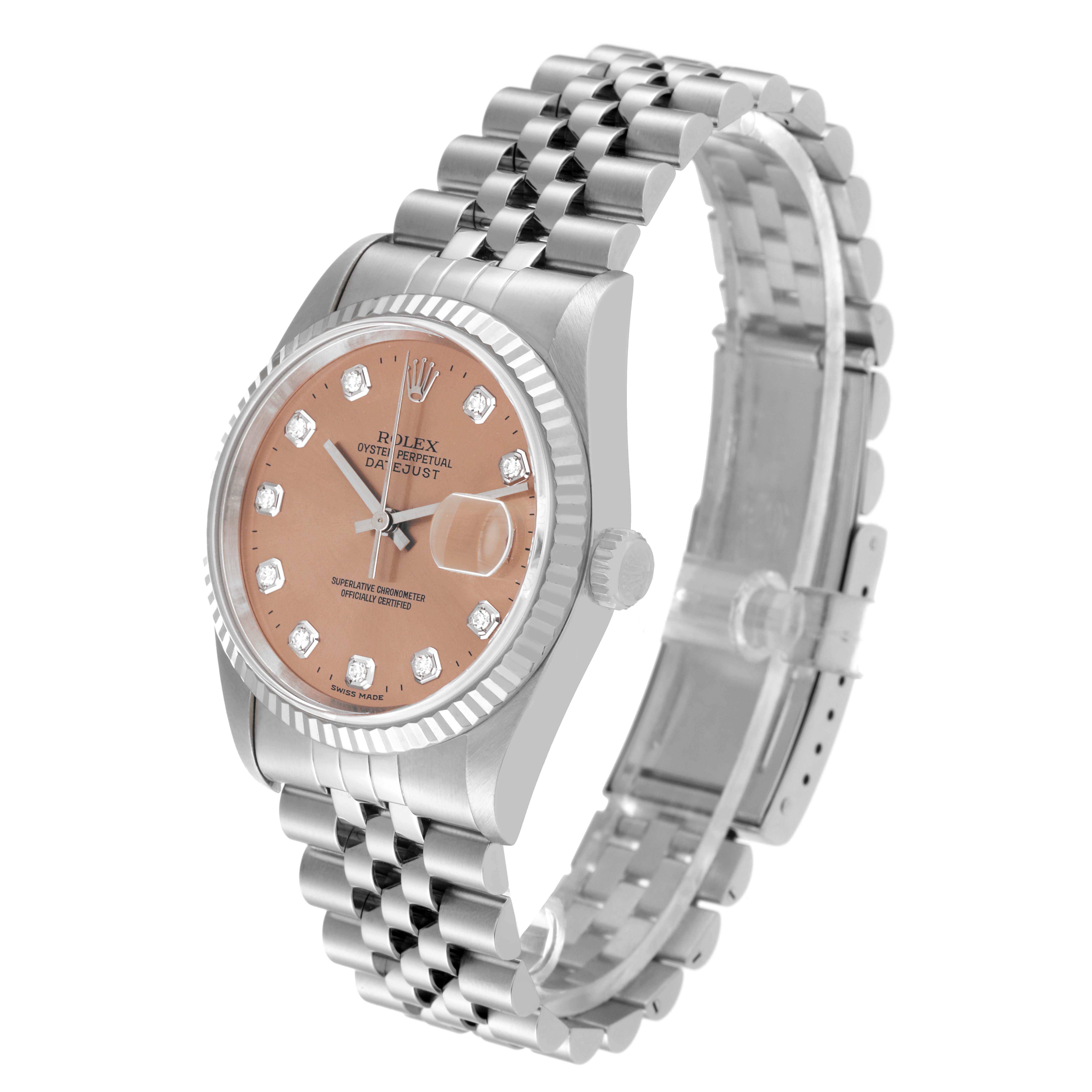 The image shows a Rolex Datejust 16234 Men's Stainless Steel Pink Dial 16234 Men's Stainless Steel Pink Dial watch from an angled side view, highlighting its dial, bezel, and bracelet.