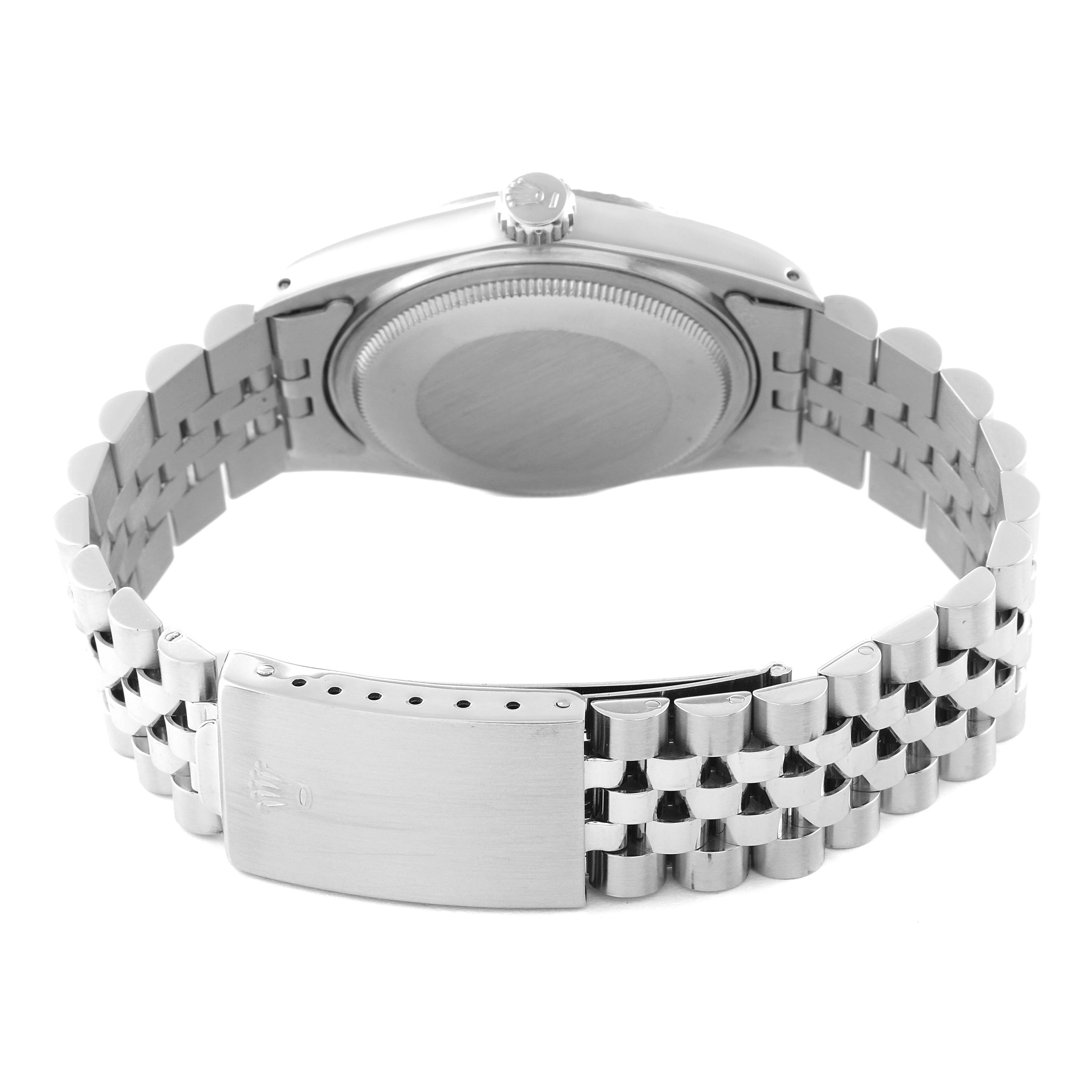 This image shows the back view of a Rolex Vintage Collection 16014 Men's Stainless Steel Silver Dial 16014 Men's Stainless Steel Silver Dial watch, focusing on the back case and metal bracelet clasp.