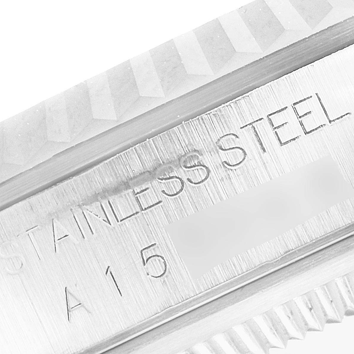 The image shows a close-up angle of the stainless steel bezel and the edge of the case of a Rolex Datejust 16234 Men's Stainless Steel Silver Dial 16234 Men's Stainless Steel Silver Dial watch.