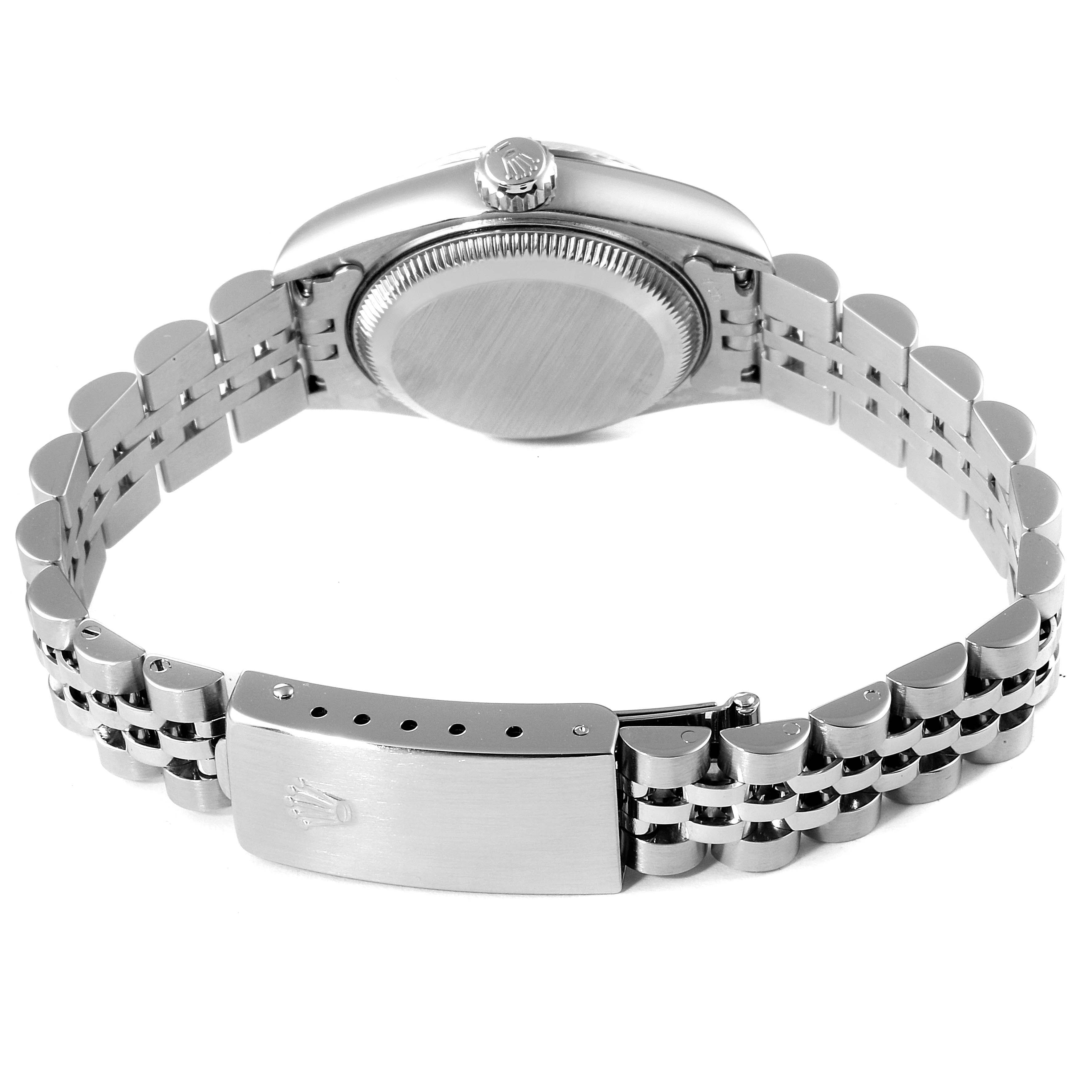 The image shows the back view of a Rolex Datejust 79174 Women
s Stainless Steel White Dial 79174 Women
s Stainless Steel White Dial watch highlighting its case back, bracelet, and clasp.