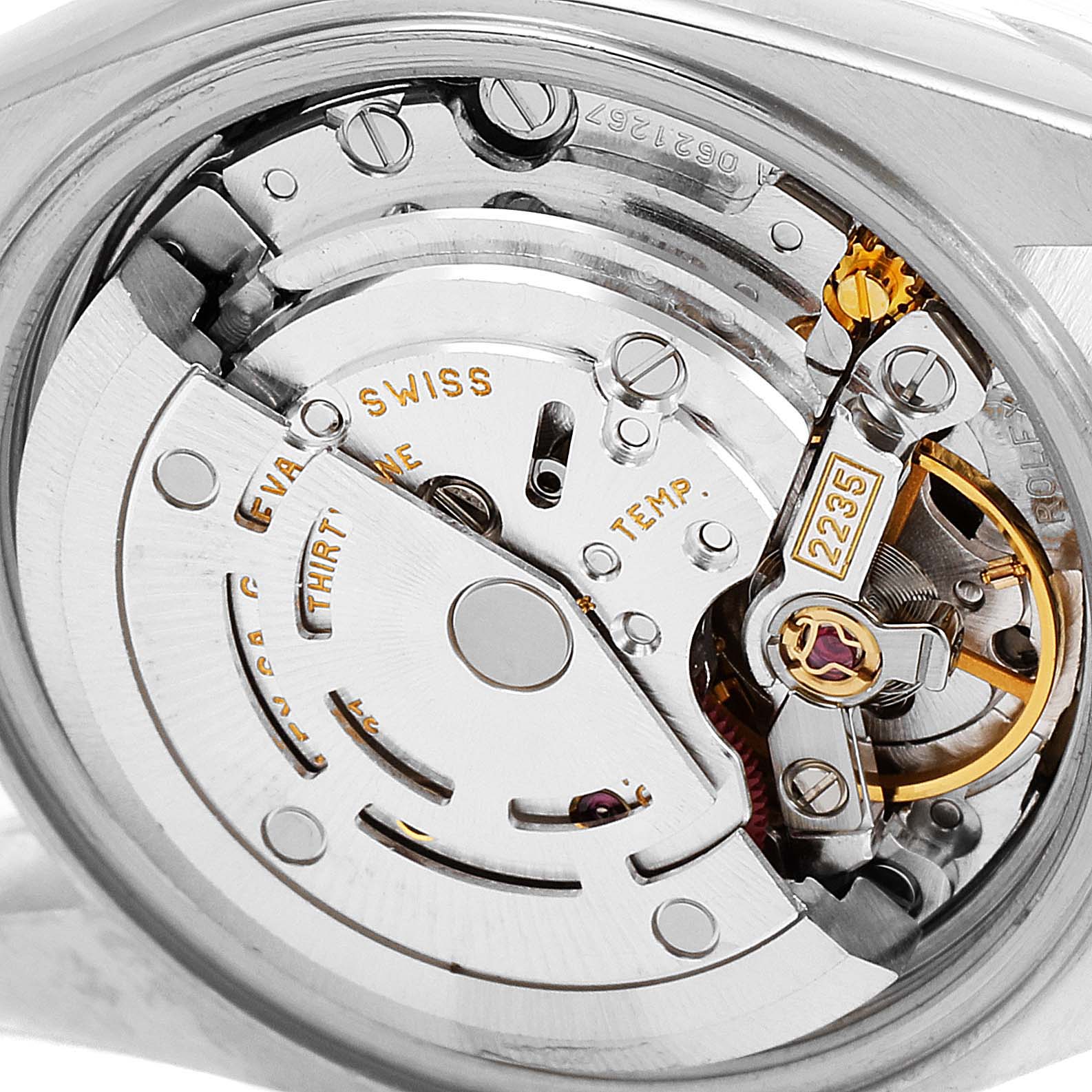 The image shows the inner movement mechanism of a Rolex Datejust 79174 Women
s Stainless Steel White Dial 79174 Women
s Stainless Steel White Dial watch at a close-up angle.