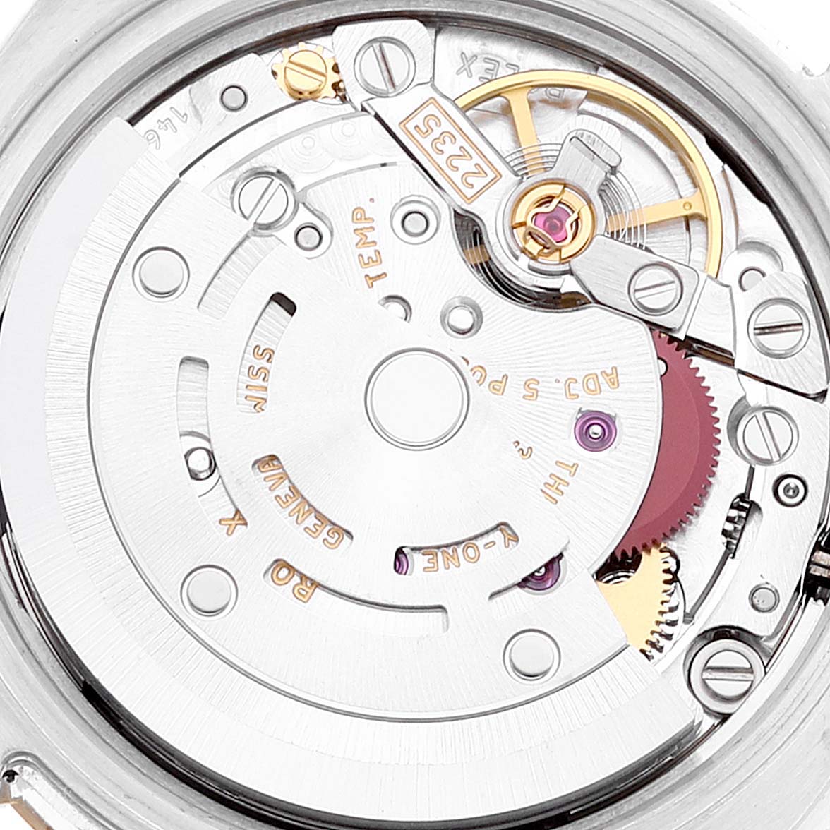 The image shows the intricate internal mechanism of the Rolex Datejust 179173 Women's Steel and Gold (two tone) Black Dial 179173 Women's Steel and Gold (two tone) Black Dial watch at a close-up angle.