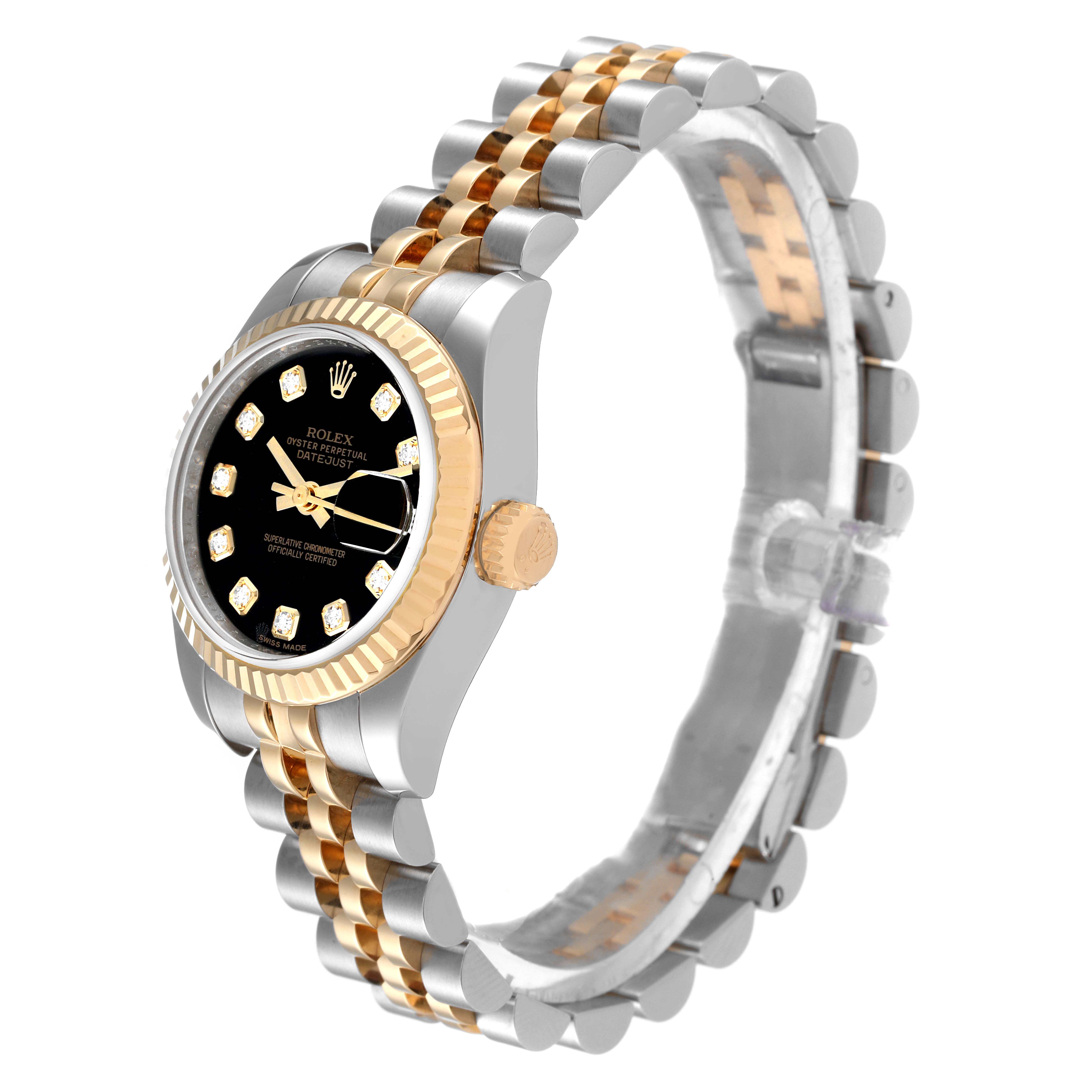 The image shows a Rolex Datejust 179173 Women's Steel and Gold (two tone) Black Dial 179173 Women's Steel and Gold (two tone) Black Dial watch from a side angle, displaying its jubilee bracelet, crown, and dial with diamond markers.