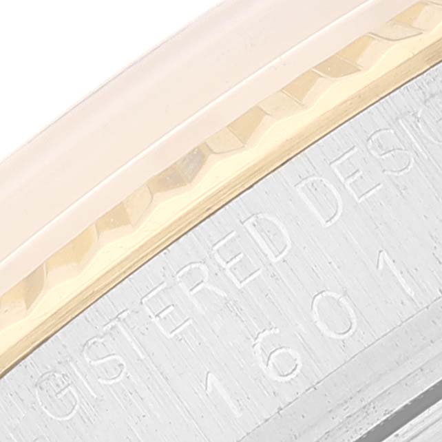 This close-up image shows the engraved case side of a Vintage Collection model Rolex watch with reference number.