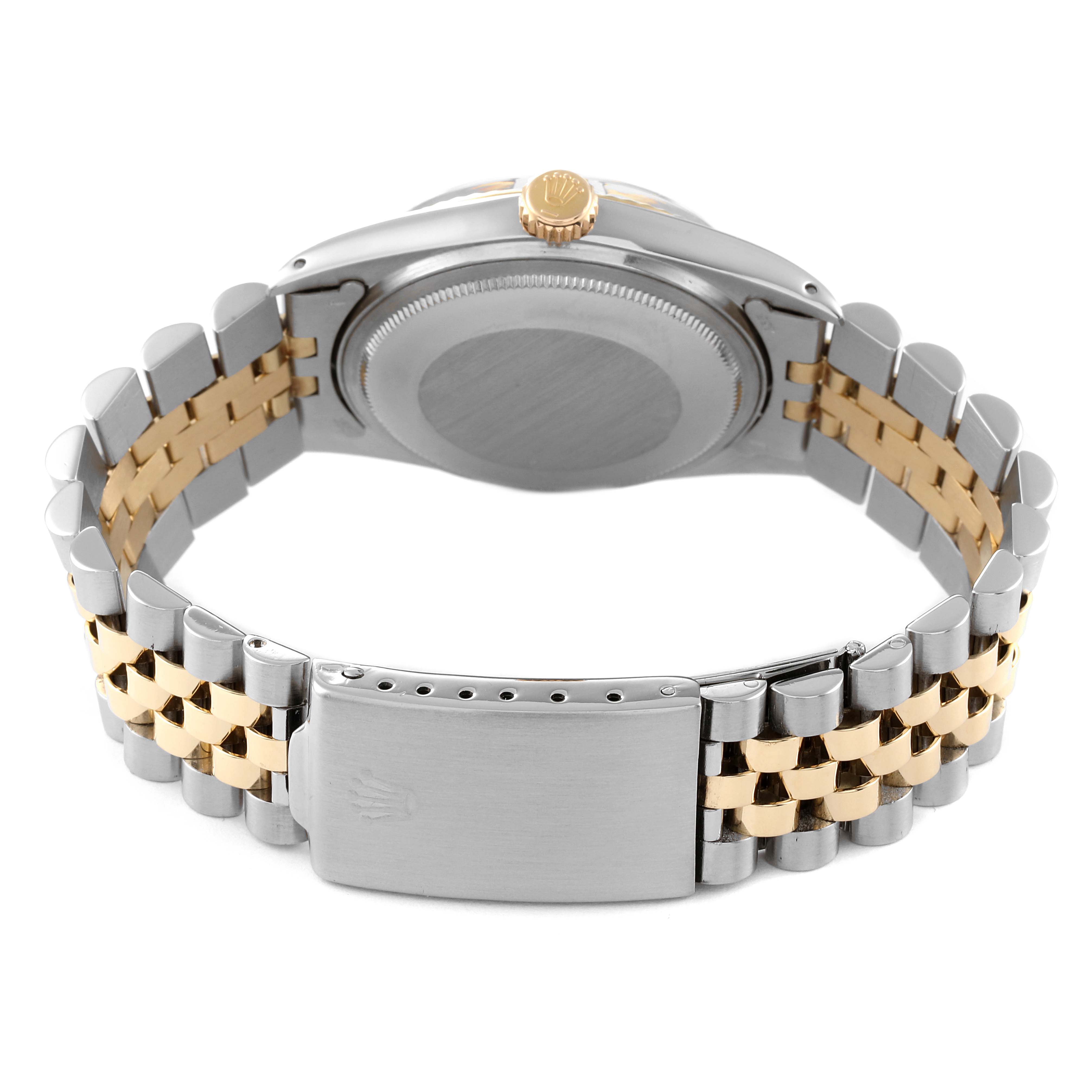 This image shows the back of a Rolex Vintage Collection 1601 Men's Steel and Gold (two tone) Champagne Dial 1601 Men's Steel and Gold (two tone) Champagne Dial watch, highlighting the case back, crown, and two-tone bracelet.