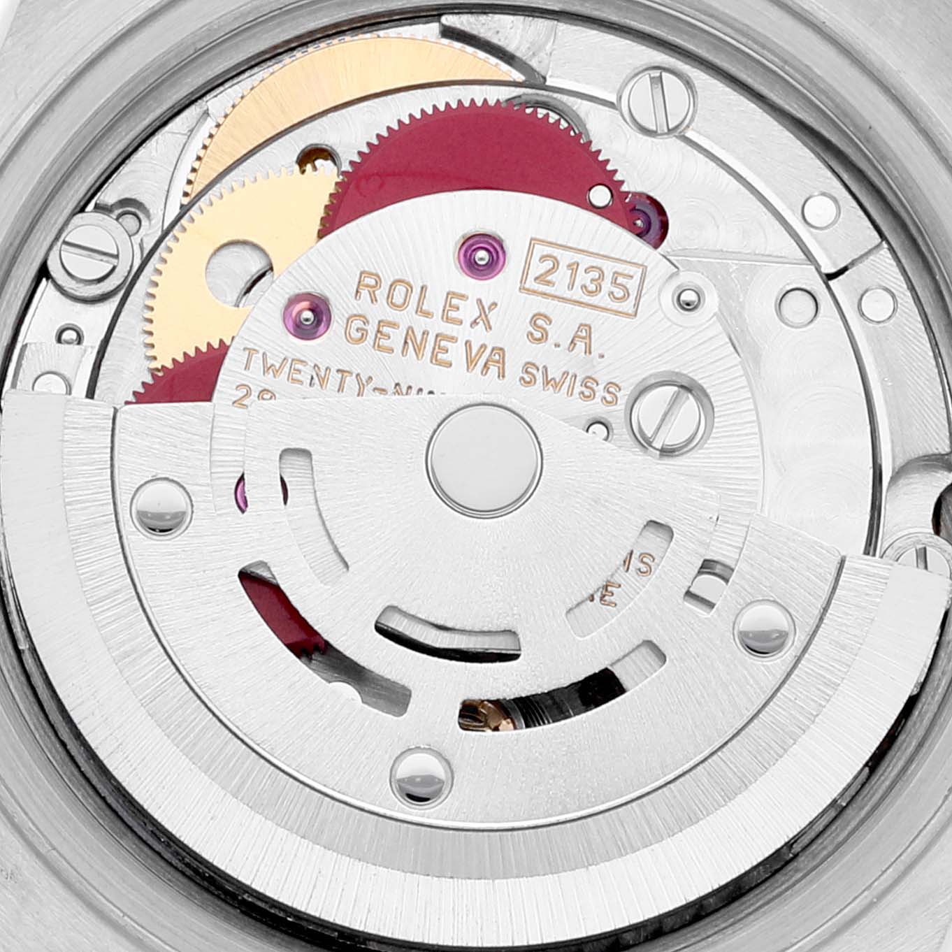 The image shows an up-close view of the internal movement of a Rolex Datejust 69173 Women's Steel and Gold (two tone) Champagne Dial 69173 Women's Steel and Gold (two tone) Champagne Dial watch, highlighting its intricate gears and components.