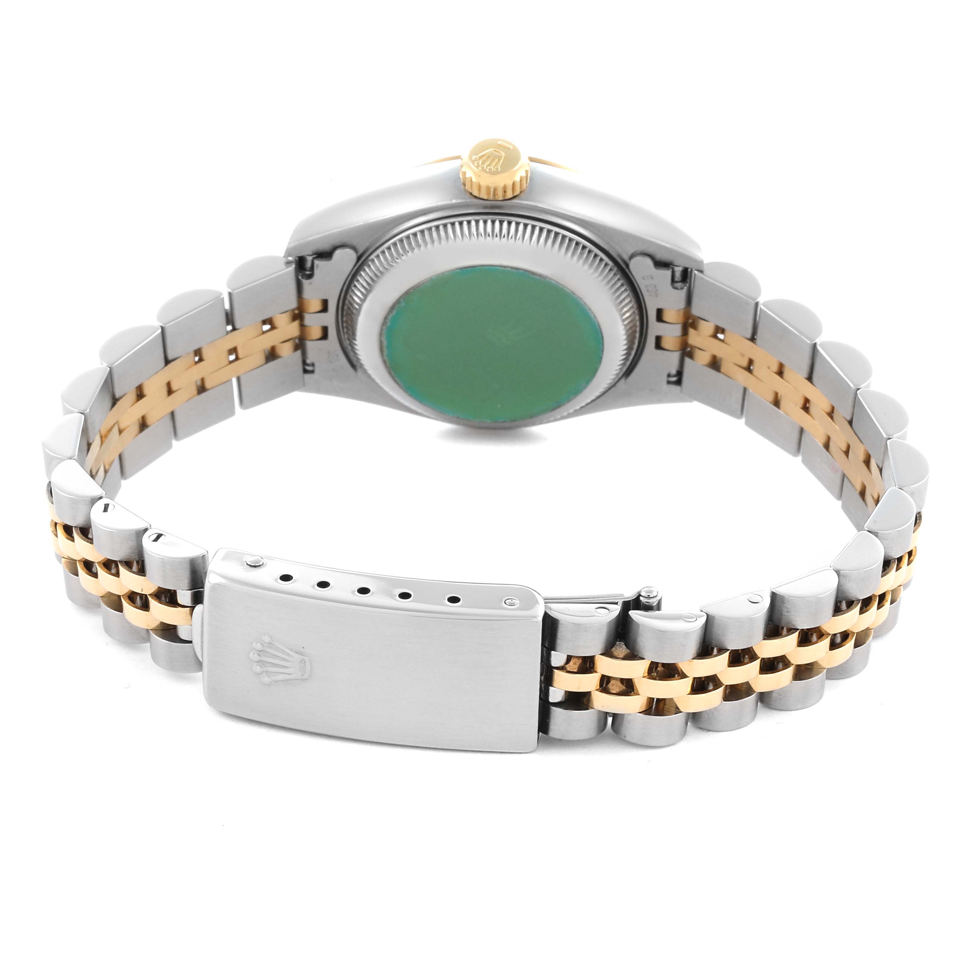 The Rolex Datejust 69173 Women
s Steel and Gold (two tone) Champagne Dial watch is shown from the back, highlighting the bracelet, clasp, case back, and crown.