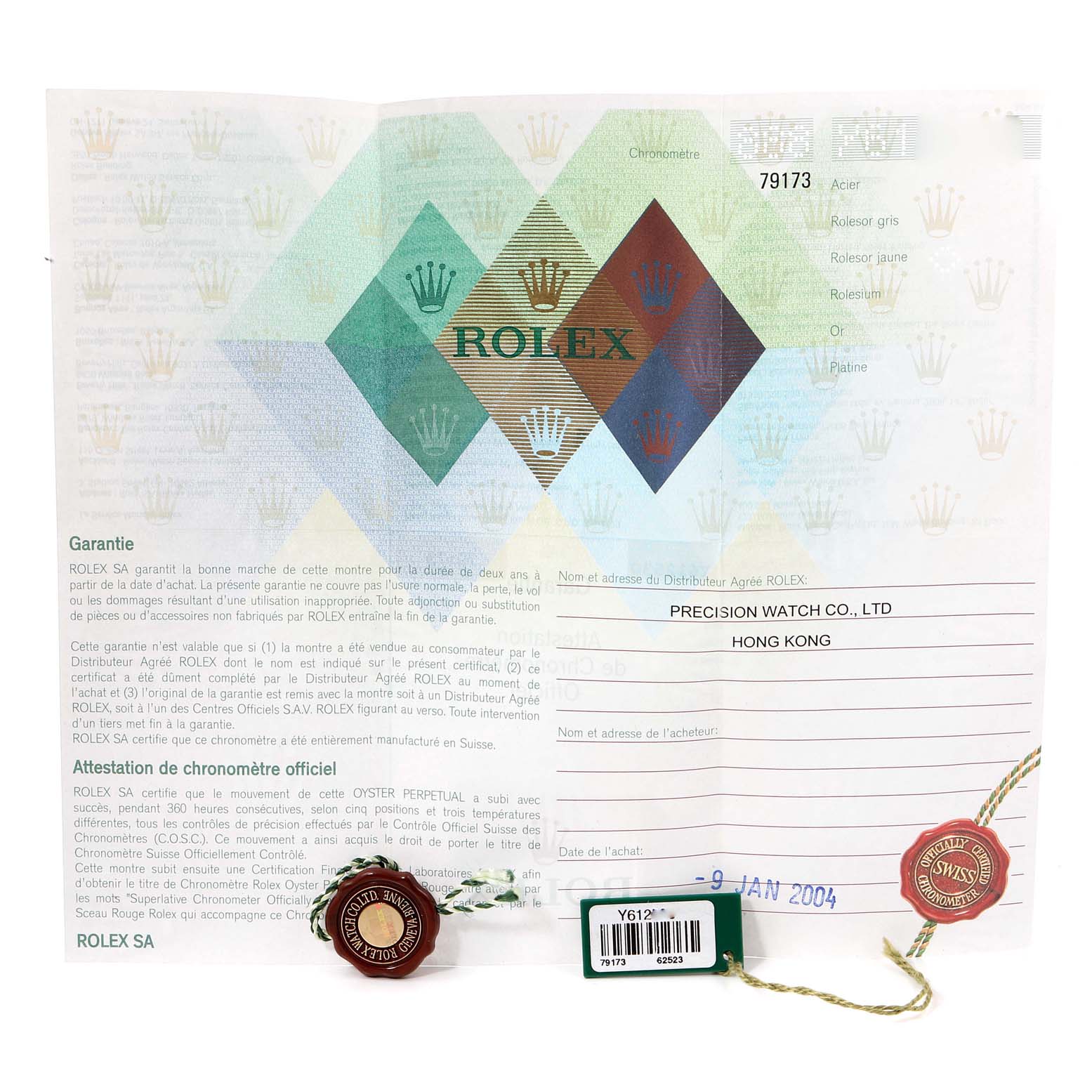 The image shows the warranty card and tags for a Rolex Datejust 79173 Women's Steel and Gold (two tone) Champagne Dial 79173 Women's Steel and Gold (two tone) Champagne Dial model.