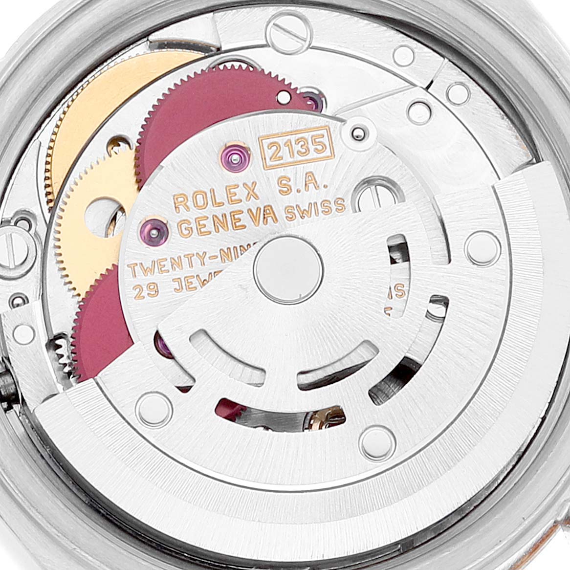 This image shows the internal mechanism and movement parts of a Rolex Datejust 69173 Women's Steel and Gold (two tone) Champagne Dial 69173 Women's Steel and Gold (two tone) Champagne Dial watch, model 2135.
