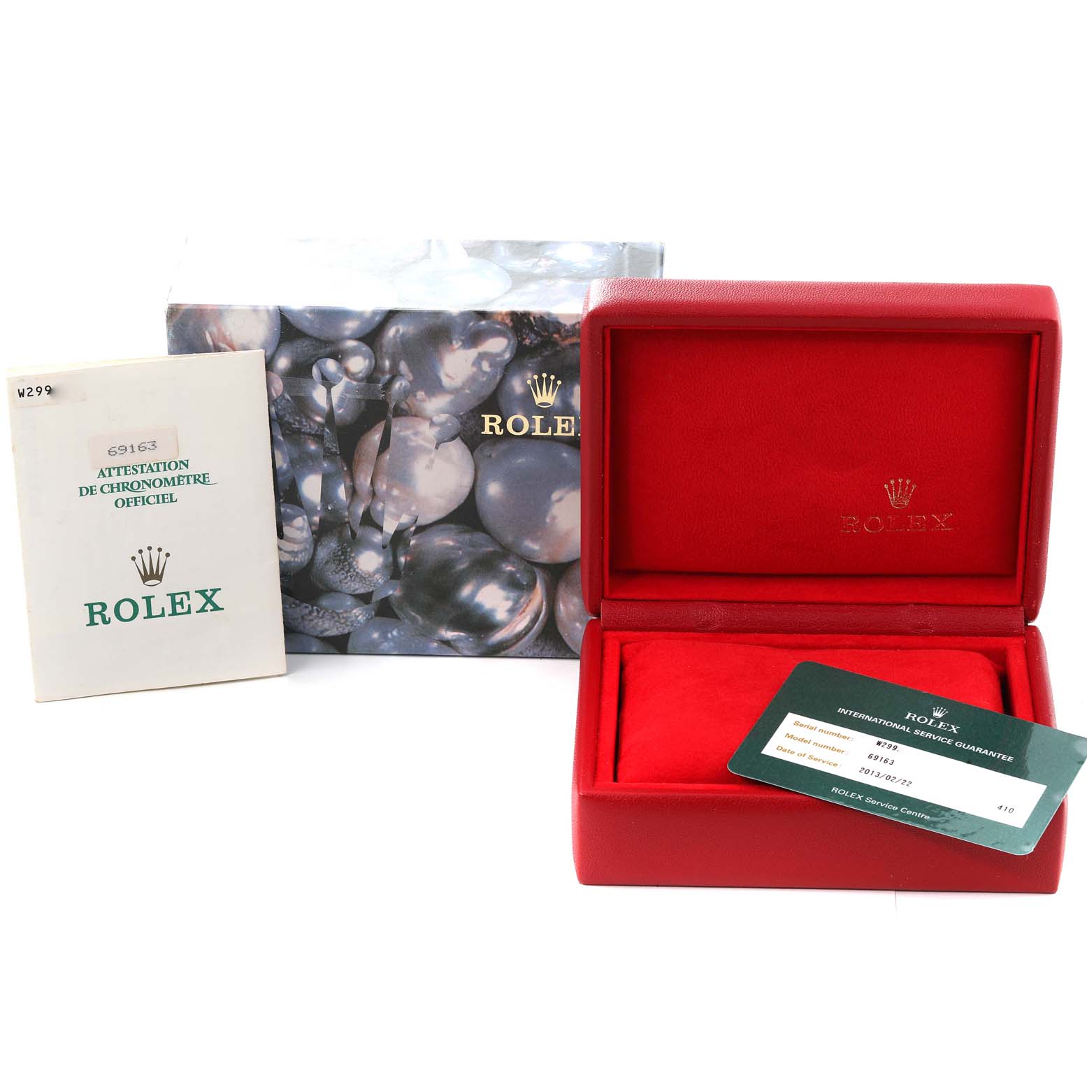 The image shows a red Rolex Datejust 69163 Women's Steel and Gold (two tone) Champagne Dial 69163 Women's Steel and Gold (two tone) Champagne Dial watch box, guarantee card, outer box, and official chronometer certification booklet.