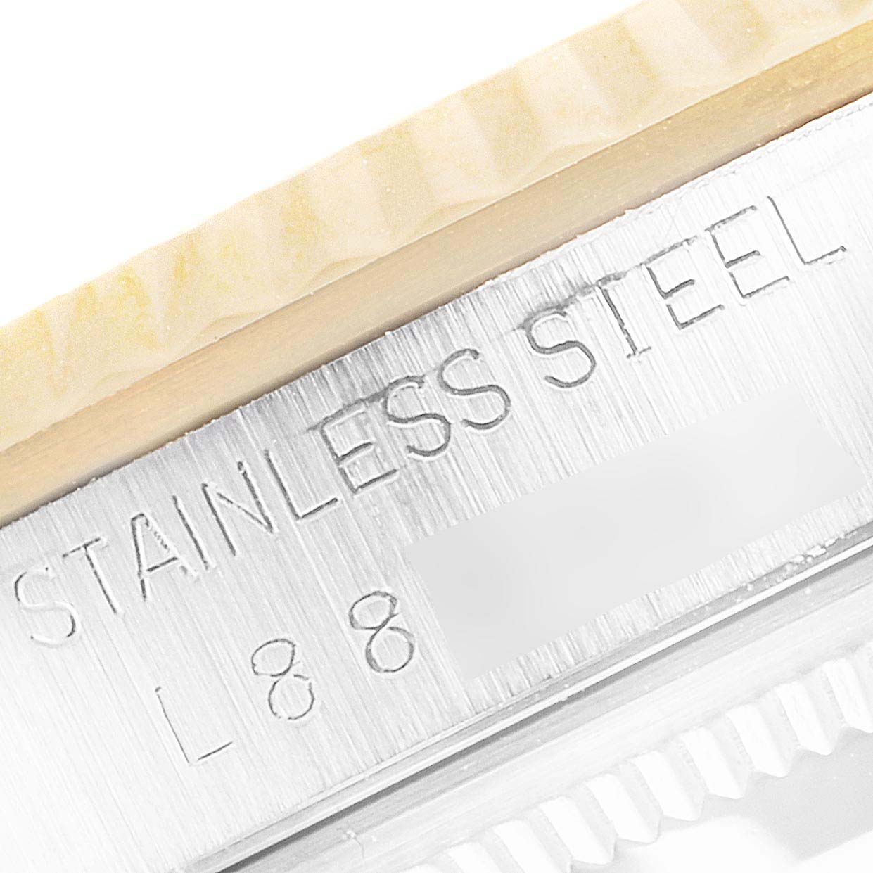 The image shows a close-up angle of the Rolex Datejust 16233 Men's Steel and Gold (two tone) Silver Dial 16233 Men's Steel and Gold (two tone) Silver Dial watch, highlighting the stainless steel bezel and engravings.