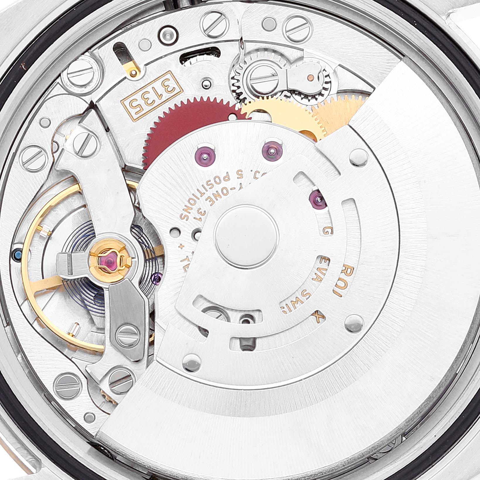 This is a close-up view of the movement mechanism inside a Rolex Datejust 116233 Men's Steel and Gold (two tone) Silver Dial 116233 Men's Steel and Gold (two tone) Silver Dial watch.
