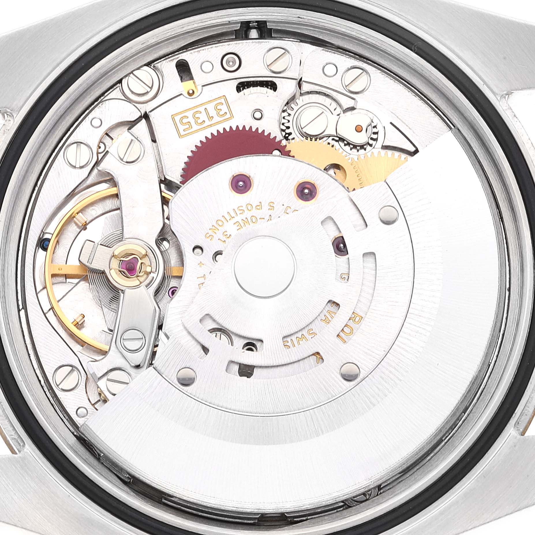 This image shows the movement and internal mechanisms of a Rolex Datejust 116233 Men's Steel and Gold (two tone) Silver Dial 116233 Men's Steel and Gold (two tone) Silver Dial model watch, viewed from the back.