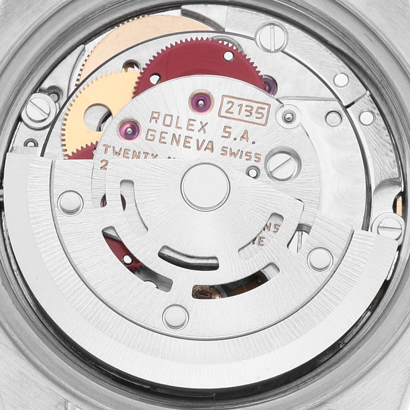 This close-up image shows the intricate internal mechanism of the Rolex Datejust 69173 Women's Steel and Gold (two tone) Champagne Dial 69173 Women's Steel and Gold (two tone) Champagne Dial watch, prominently featuring its gears and rotor.