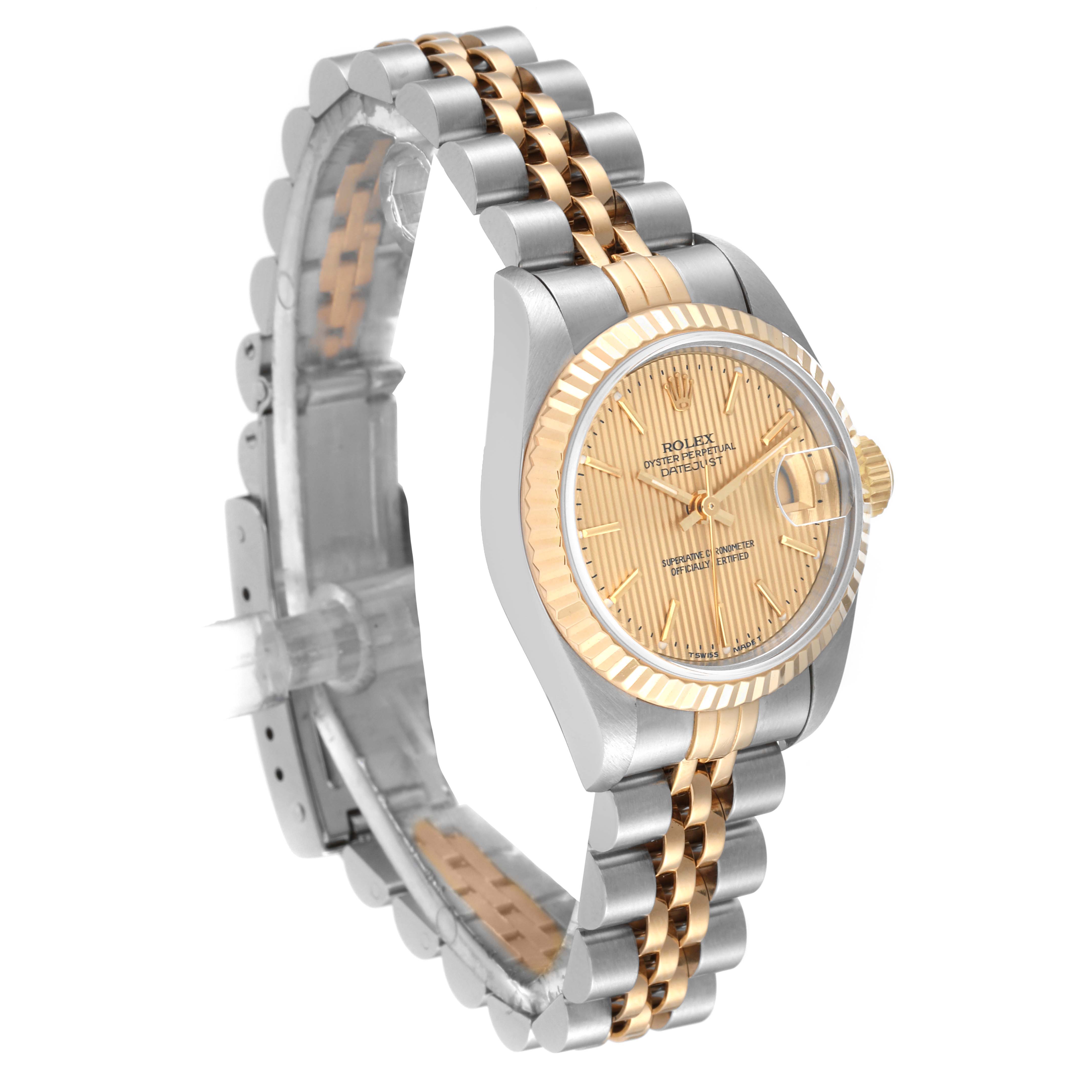 This image shows a Rolex Datejust 69173 Women's Steel and Gold (two tone) Champagne Dial 69173 Women's Steel and Gold (two tone) Champagne Dial watch from a left-angled view, highlighting its gold and silver bracelet, bezel, and dial.