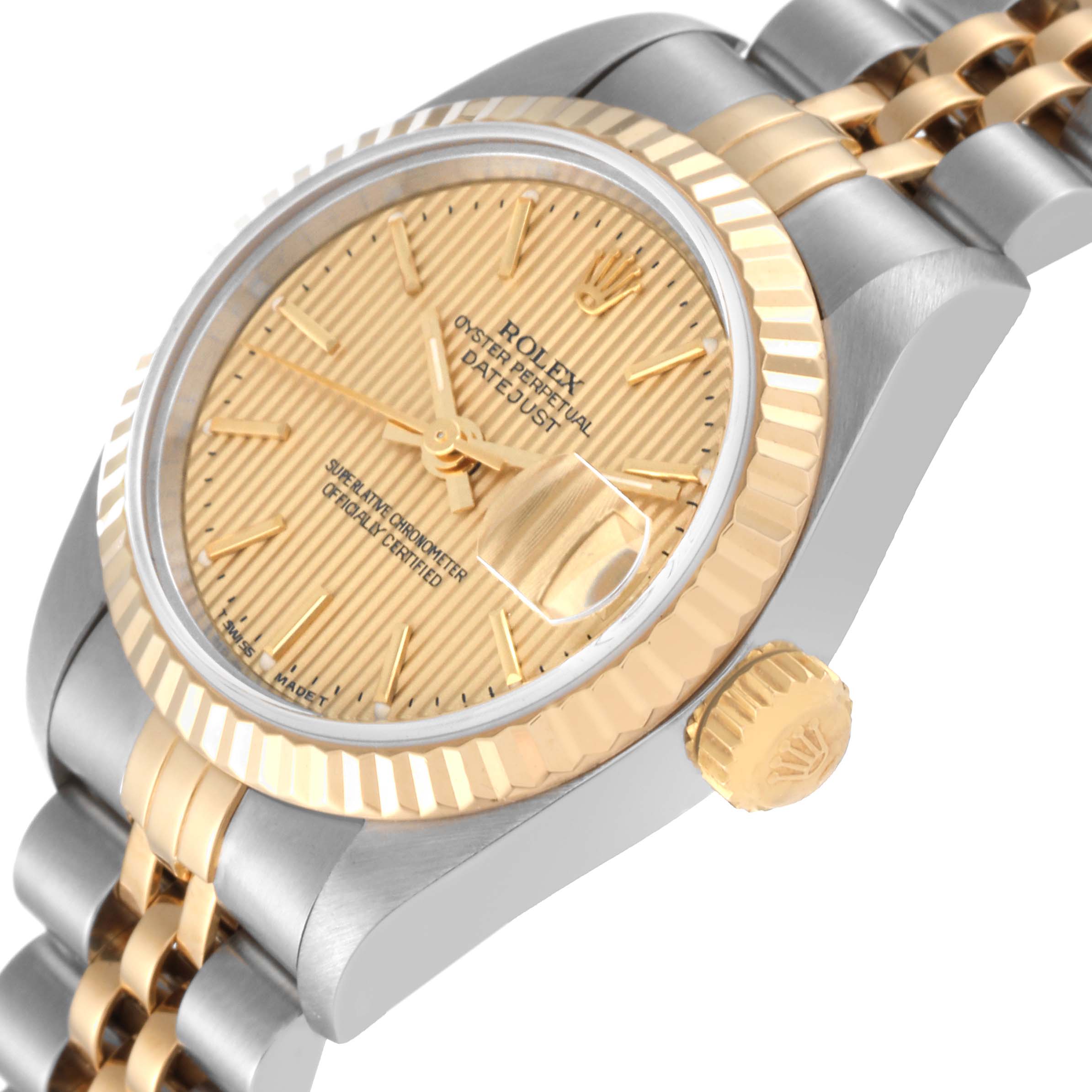 The image shows a three-quarter angle of the Rolex Datejust 69173 Women's Steel and Gold (two tone) Champagne Dial 69173 Women's Steel and Gold (two tone) Champagne Dial watch, highlighting the dial, bezel, crown, and part of the bracelet.