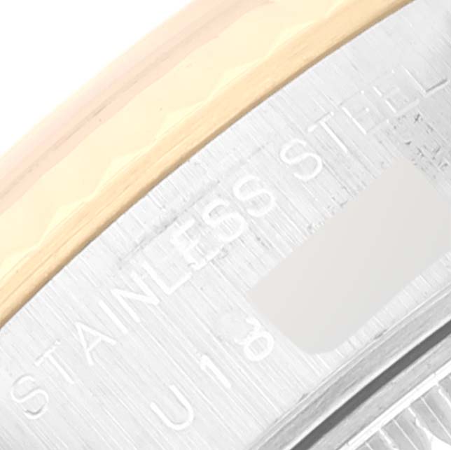 The image shows a close-up of the stainless steel and gold bezel of a Rolex Datejust 69173 Women's Steel and Gold (two tone) Champagne Dial 69173 Women's Steel and Gold (two tone) Champagne Dial watch.