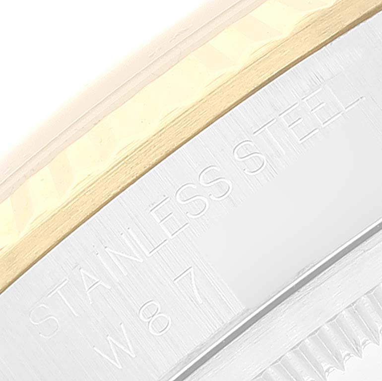 The close-up shows the stainless steel and gold bezel of a Rolex Datejust 16233 Men's Steel and Gold (two tone) White Dial 16233 Men's Steel and Gold (two tone) White Dial watch.