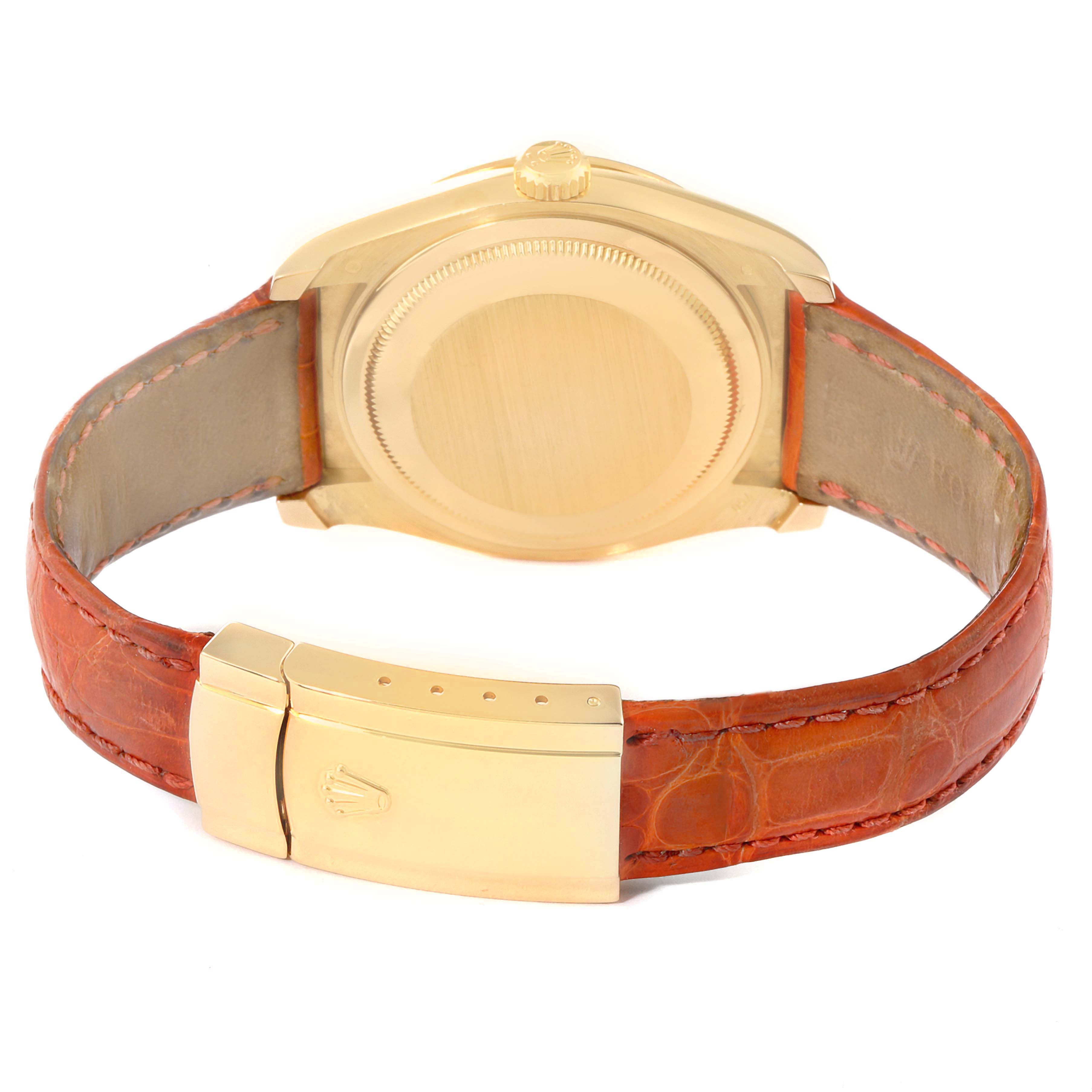 The image shows the back view of a Rolex Datejust 116188 Men's Yellow Gold Mother of Pearl Dial 116188 Men's Yellow Gold Mother of Pearl Dial watch with a gold case and a brown leather strap.