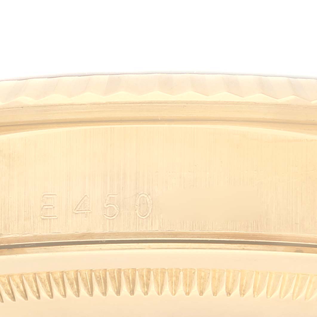 The image shows a close-up of the bezel and part of the case of the Rolex President 18238 Men
s Yellow Gold Champagne Dial 18238 Men
s Yellow Gold Champagne Dial model.