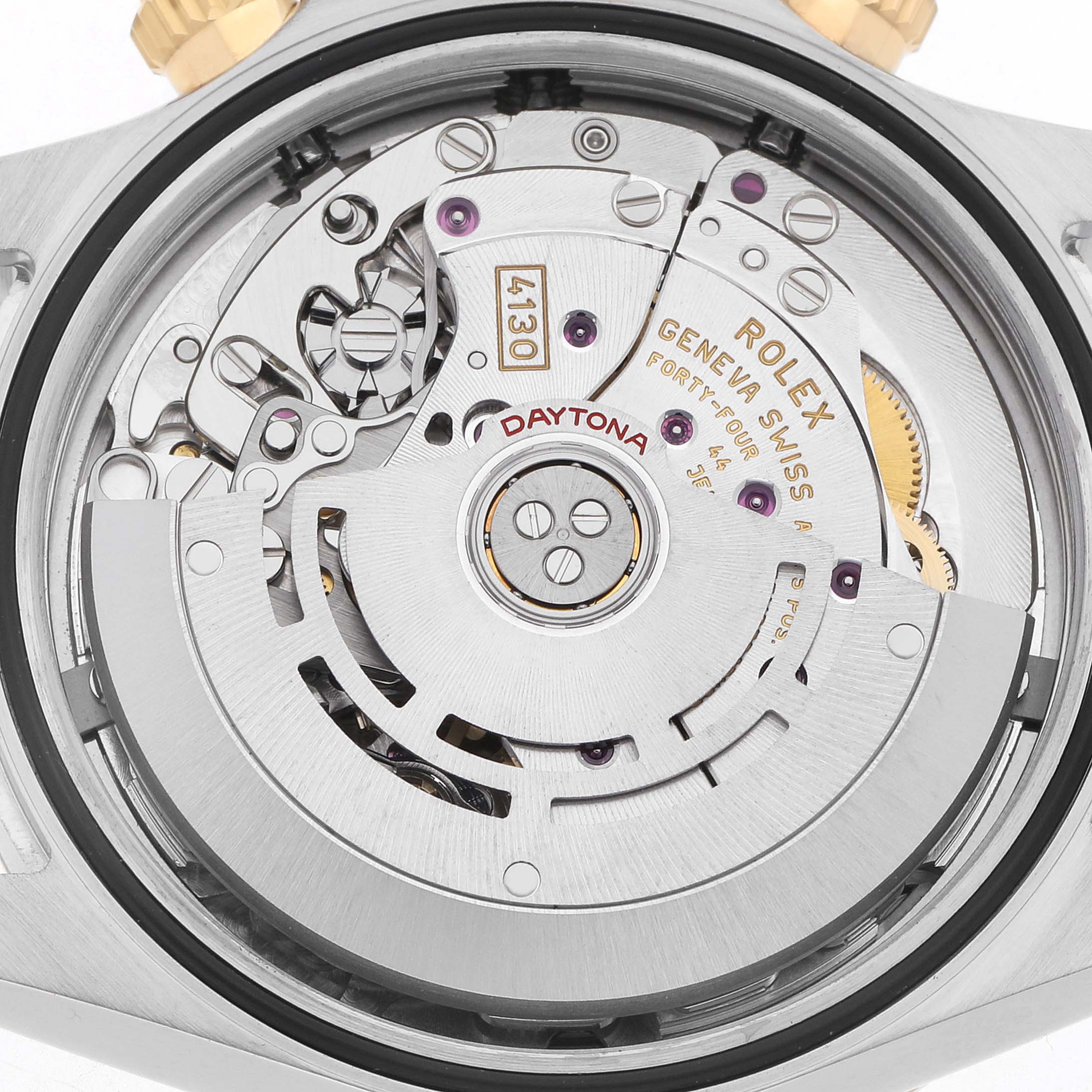 The image shows the inner mechanism of the Rolex Daytona 116503 Men
s Steel and Gold (two tone) Champagne Dial watch from a rear angle, highlighting the movement components.