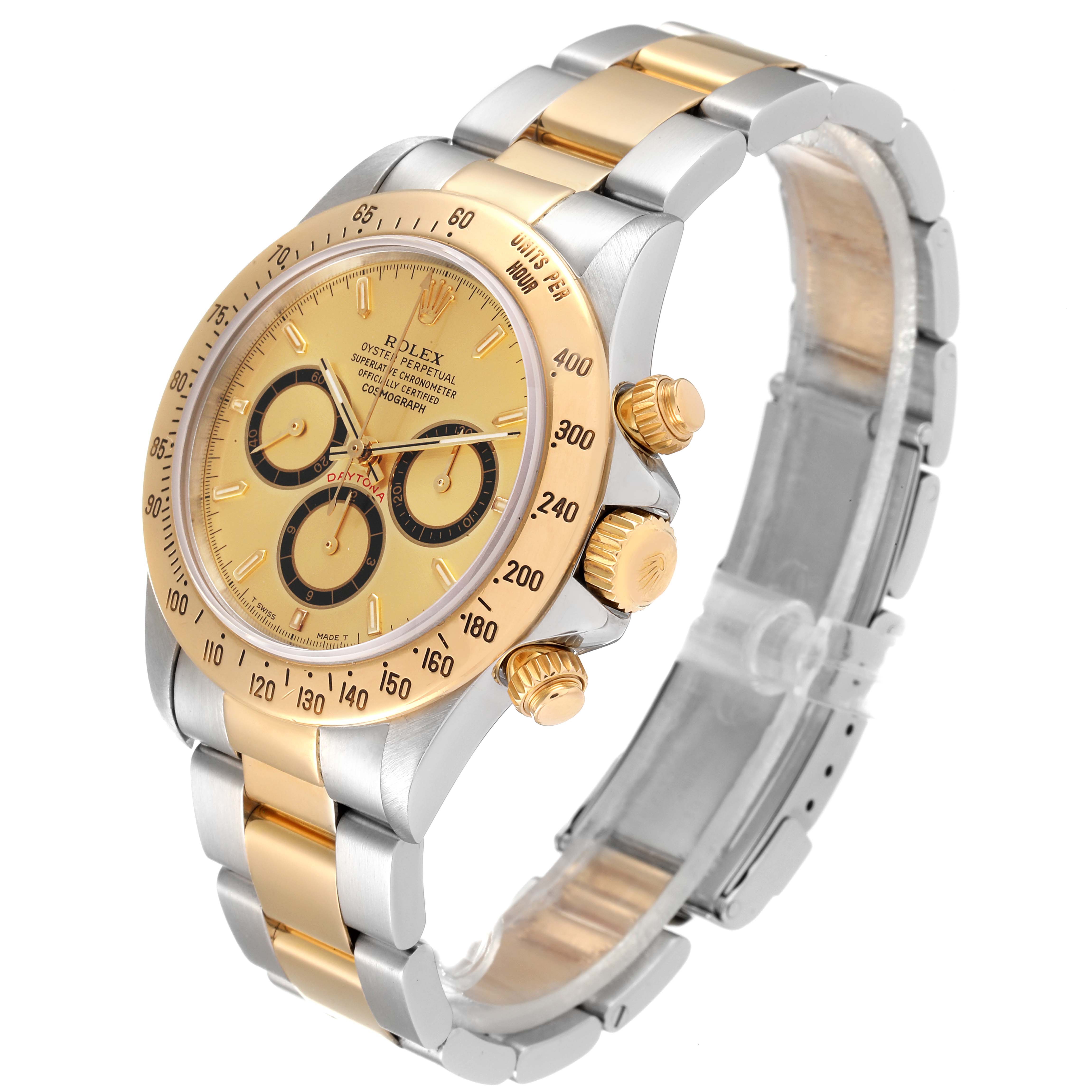 The image shows a Rolex Daytona 16523 Men
s Steel and Gold (two tone) Champagne Dial 16523 Men
s Steel and Gold (two tone) Champagne Dial watch with a two-tone band and a gold bezel, viewed at a slight angle.