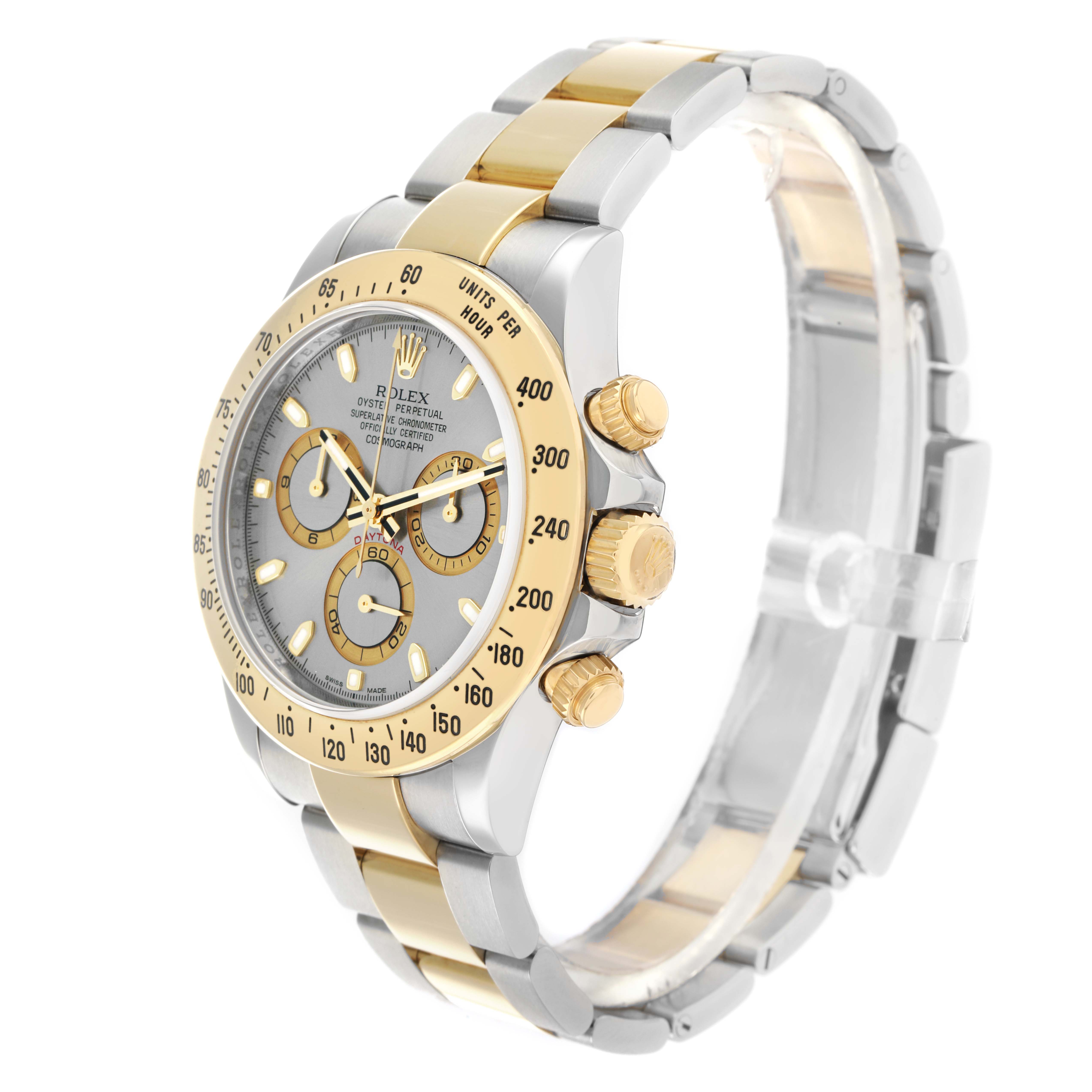 The Rolex Daytona 116523 Men
s Steel and Gold (two tone) Silver Dial watch is angled to show the face, bezel, and part of the bracelet, highlighting its gold and silver detailing.