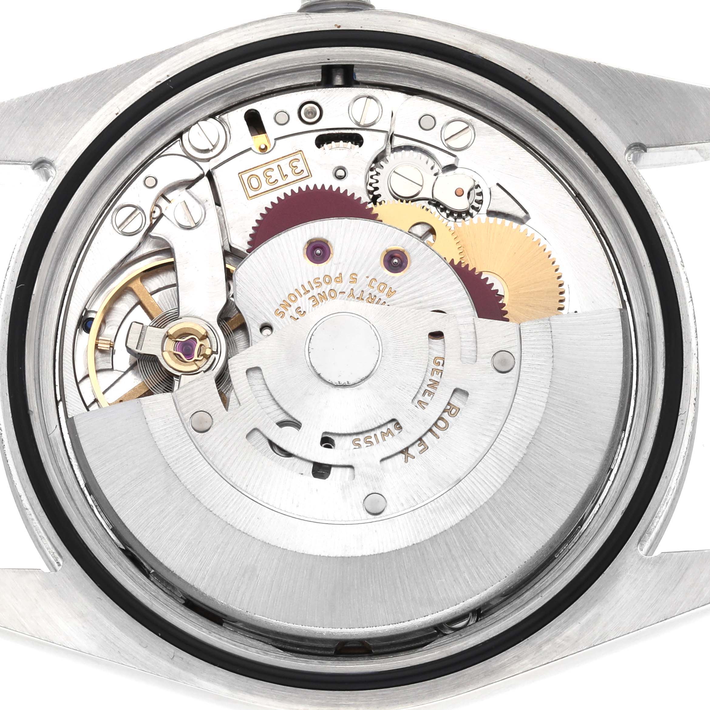 The image shows the internal mechanism of a Rolex Explorer 114270 Men
s Stainless Steel Black Dial watch from a back angle, highlighting gears and the rotor.