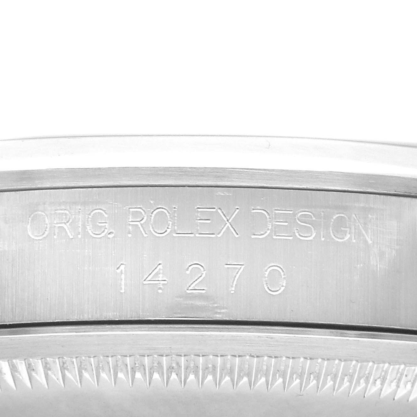 The image shows a close-up of the side of a Rolex Explorer 14270 Men
s Stainless Steel Black Dial watch case, highlighting the model number "14270" engraving.