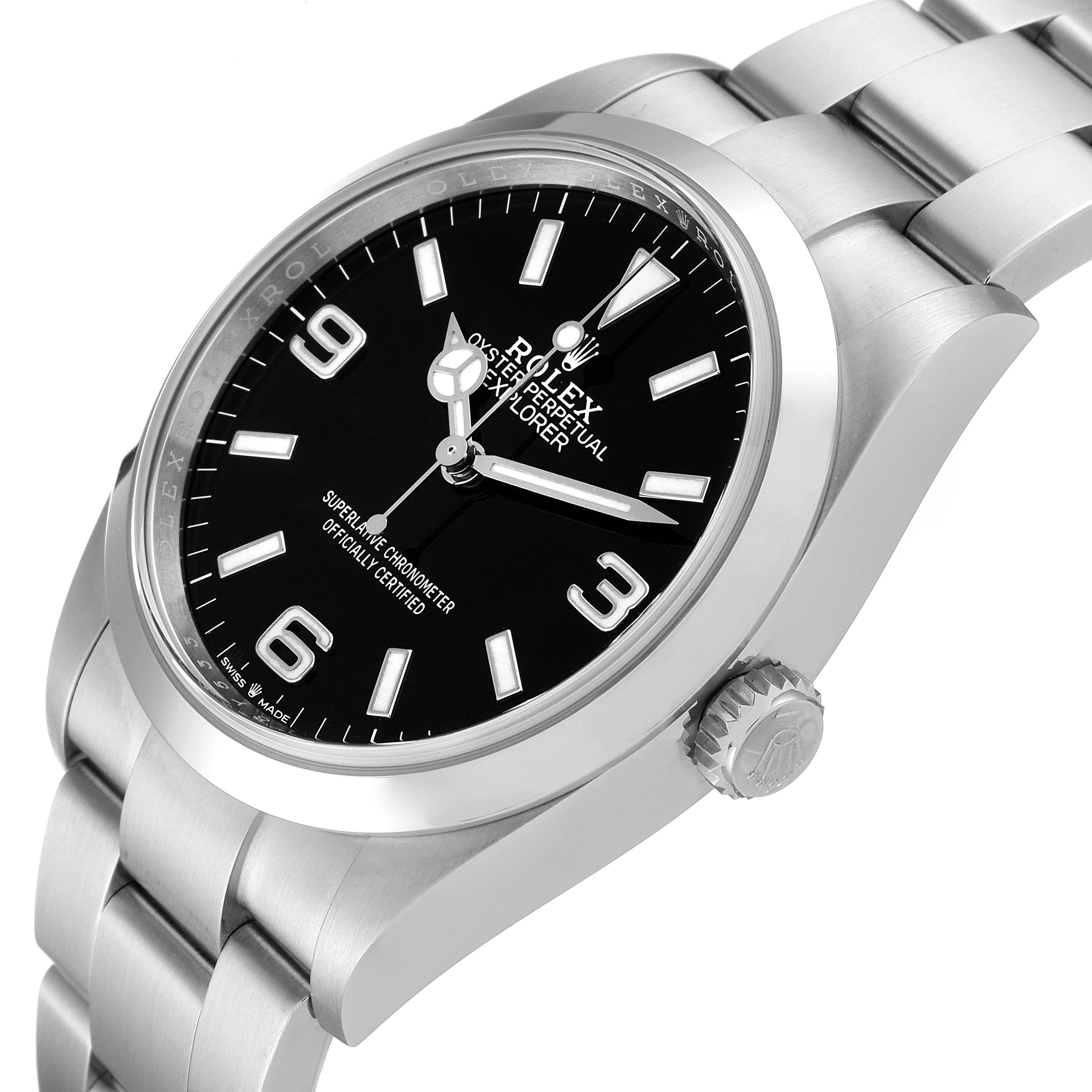 The image shows a side angle view of the Rolex Explorer 124270 Men's Stainless Steel Black Dial 124270 Men's Stainless Steel Black Dial watch, highlighting the dial, bezel, crown, and bracelet.