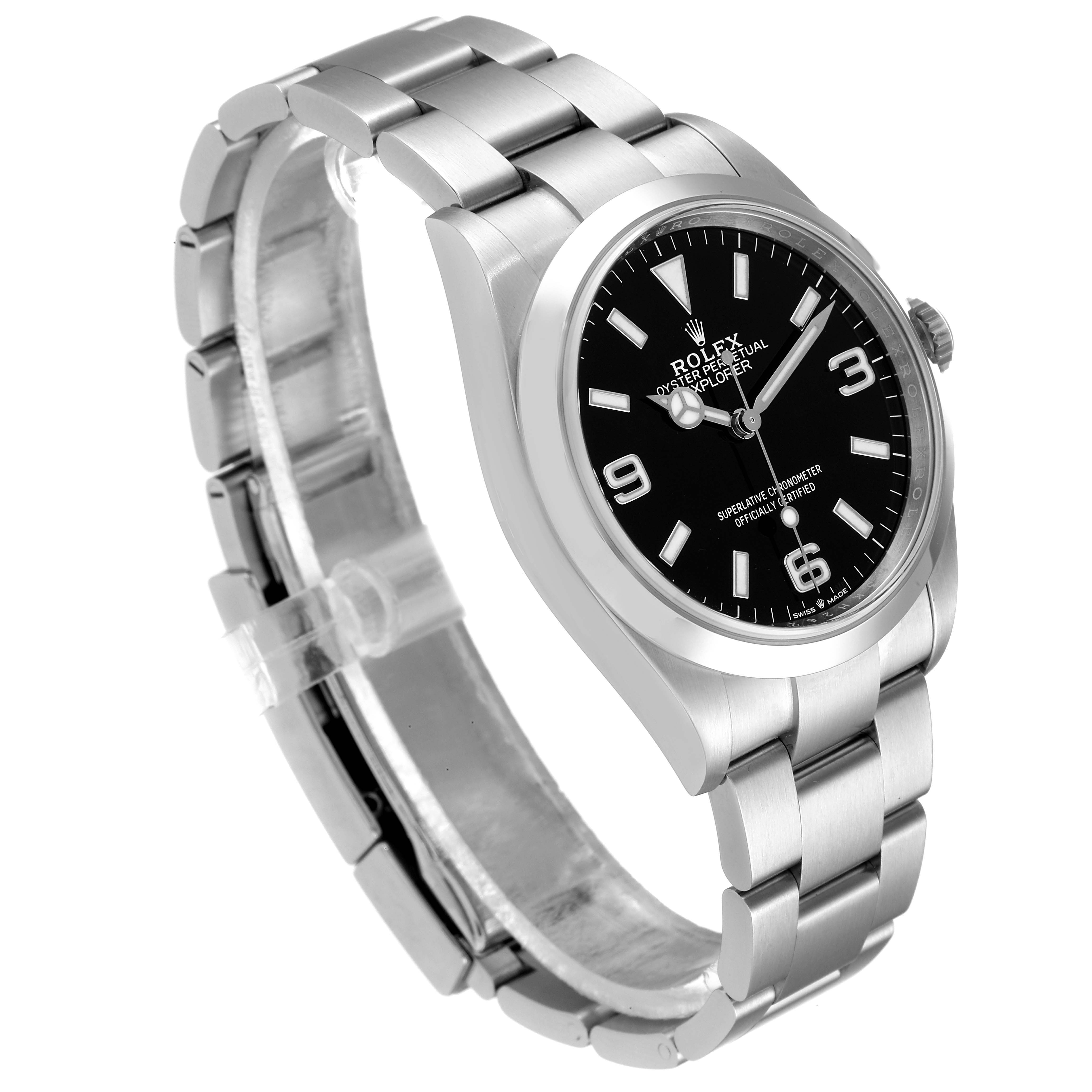 The image shows a side-angle view of a Rolex Explorer 124270 Men
s Stainless Steel Black Dial 124270 Men
s Stainless Steel Black Dial watch, showcasing its stainless steel bracelet and black dial face.