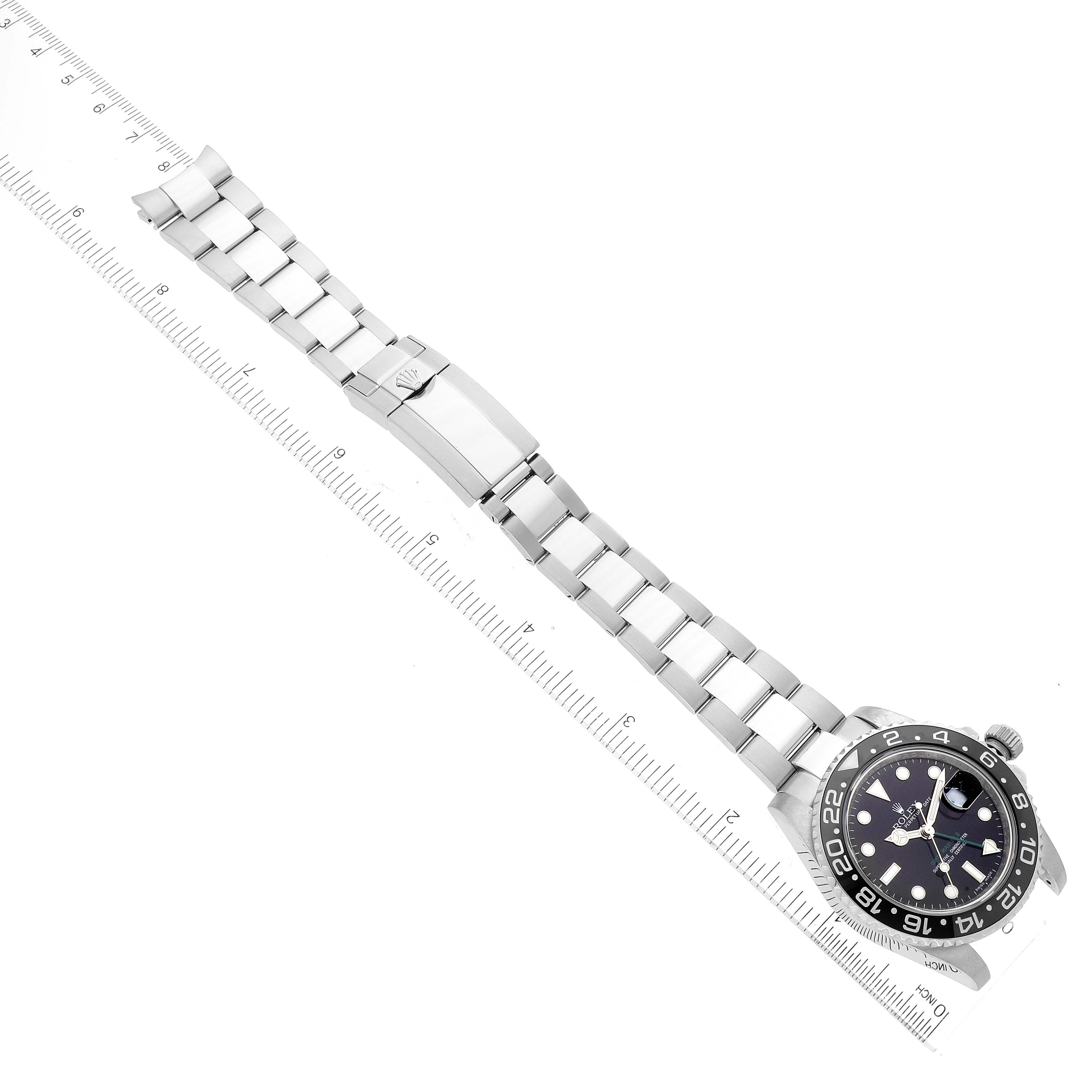 This image shows a top-down view of a Rolex GMT-Master 116710 Men's Stainless Steel Black Dial 116710 Men's Stainless Steel Black Dial watch, including the face, bezel, bracelet, and clasp.