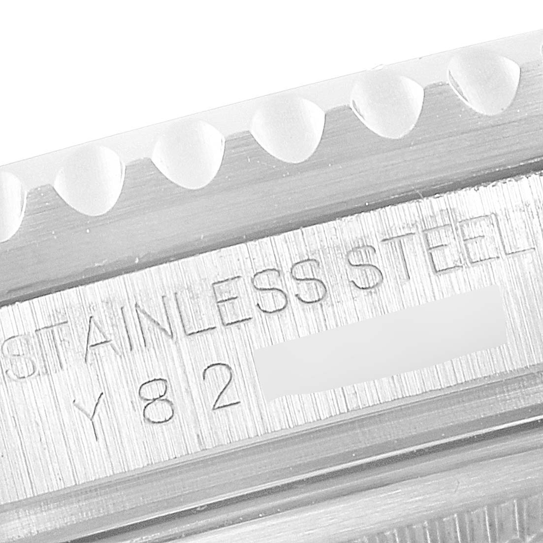 This image shows a close-up angle of the bezel and engraving on the case of a Rolex GMT-Master 16710 Men
s Stainless Steel Black Dial 16710 Men
s Stainless Steel Black Dial watch.