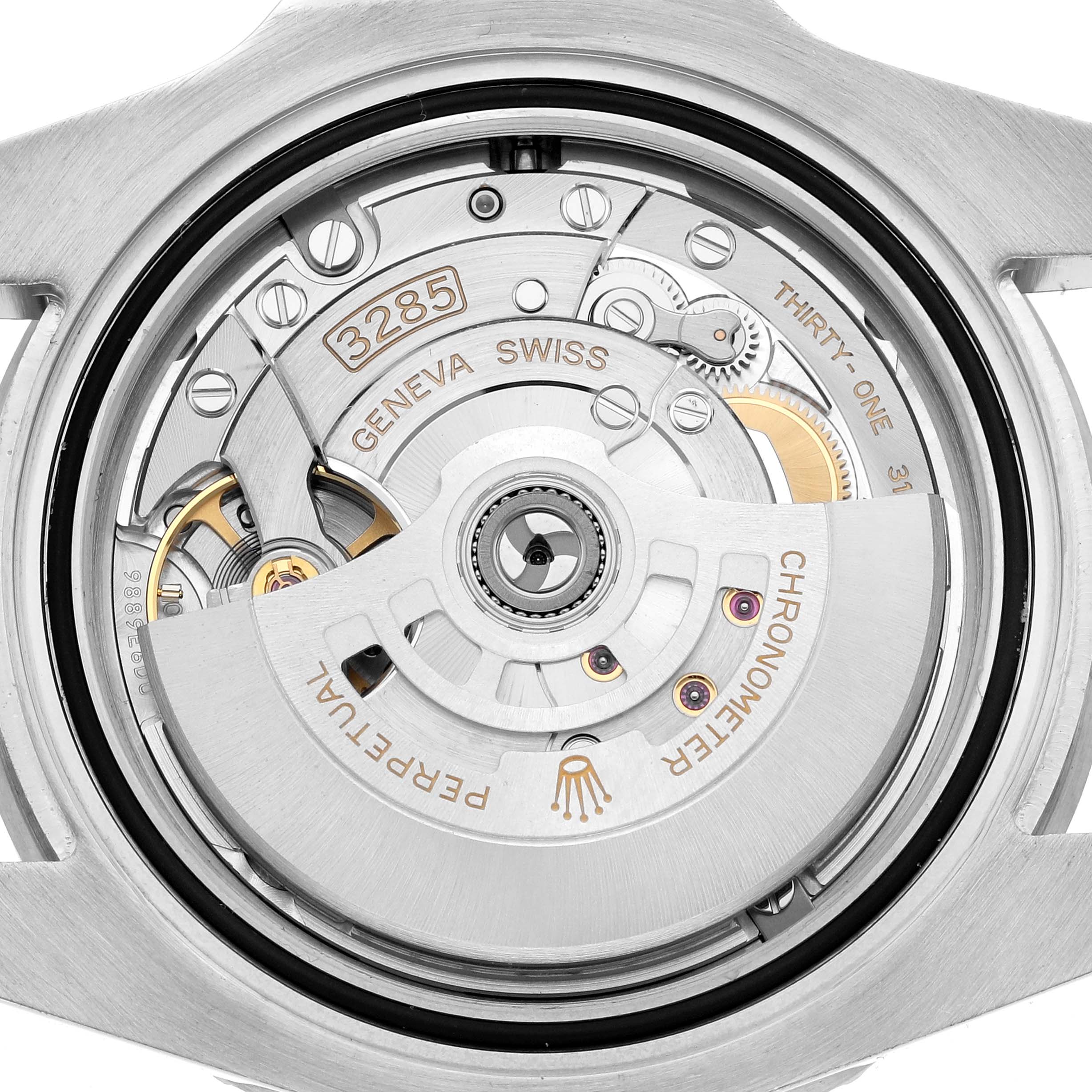 The image shows the back view of a Rolex GMT-Master 126720 Men
s Stainless Steel Black Dial, displaying the intricate movement mechanism.