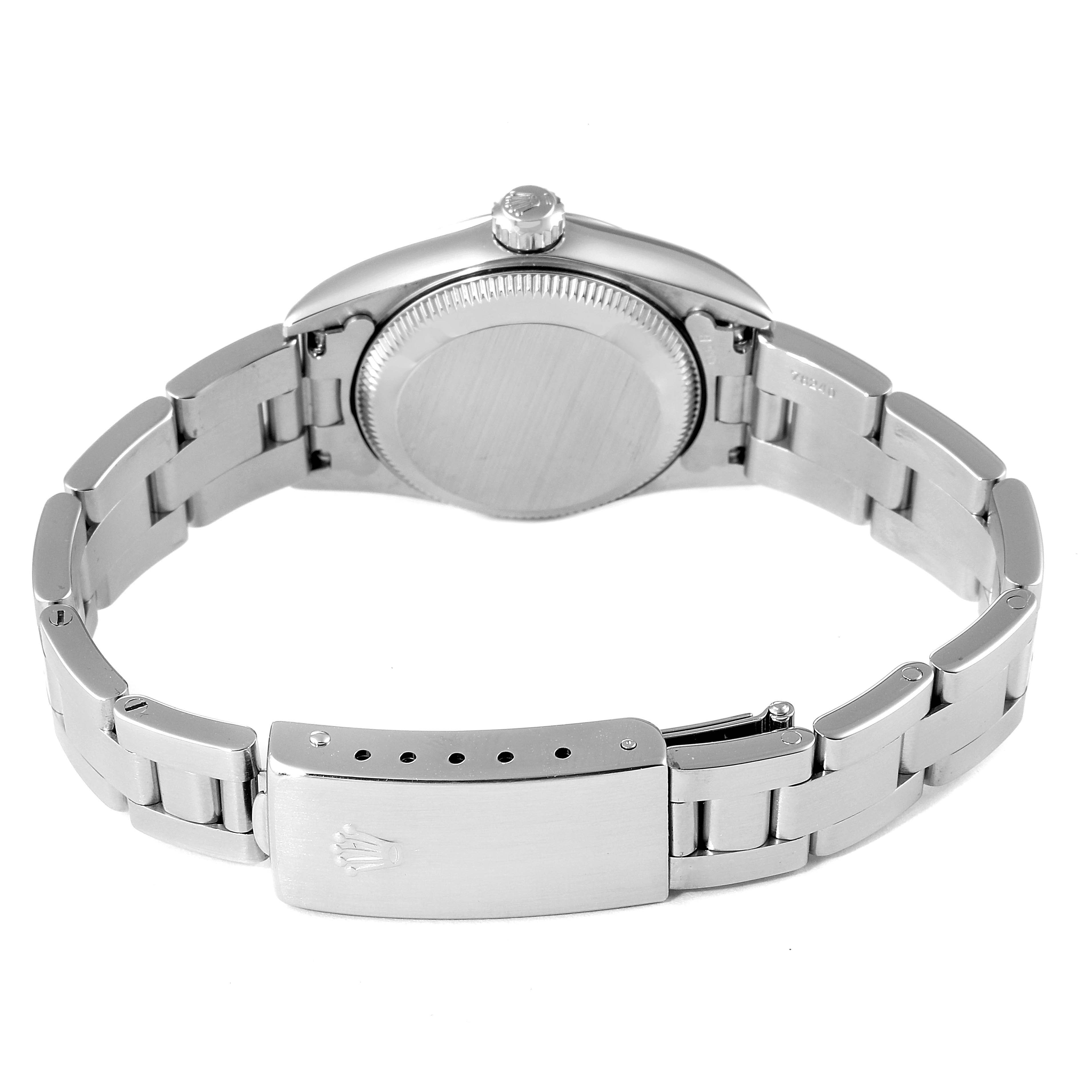 This image shows the back and clasp of a Rolex Oyster Perpetual 76080 Women
s Stainless Steel Blue Dial 76080 Women
s Stainless Steel Blue Dial watch, highlighting its stainless steel bracelet and case back.